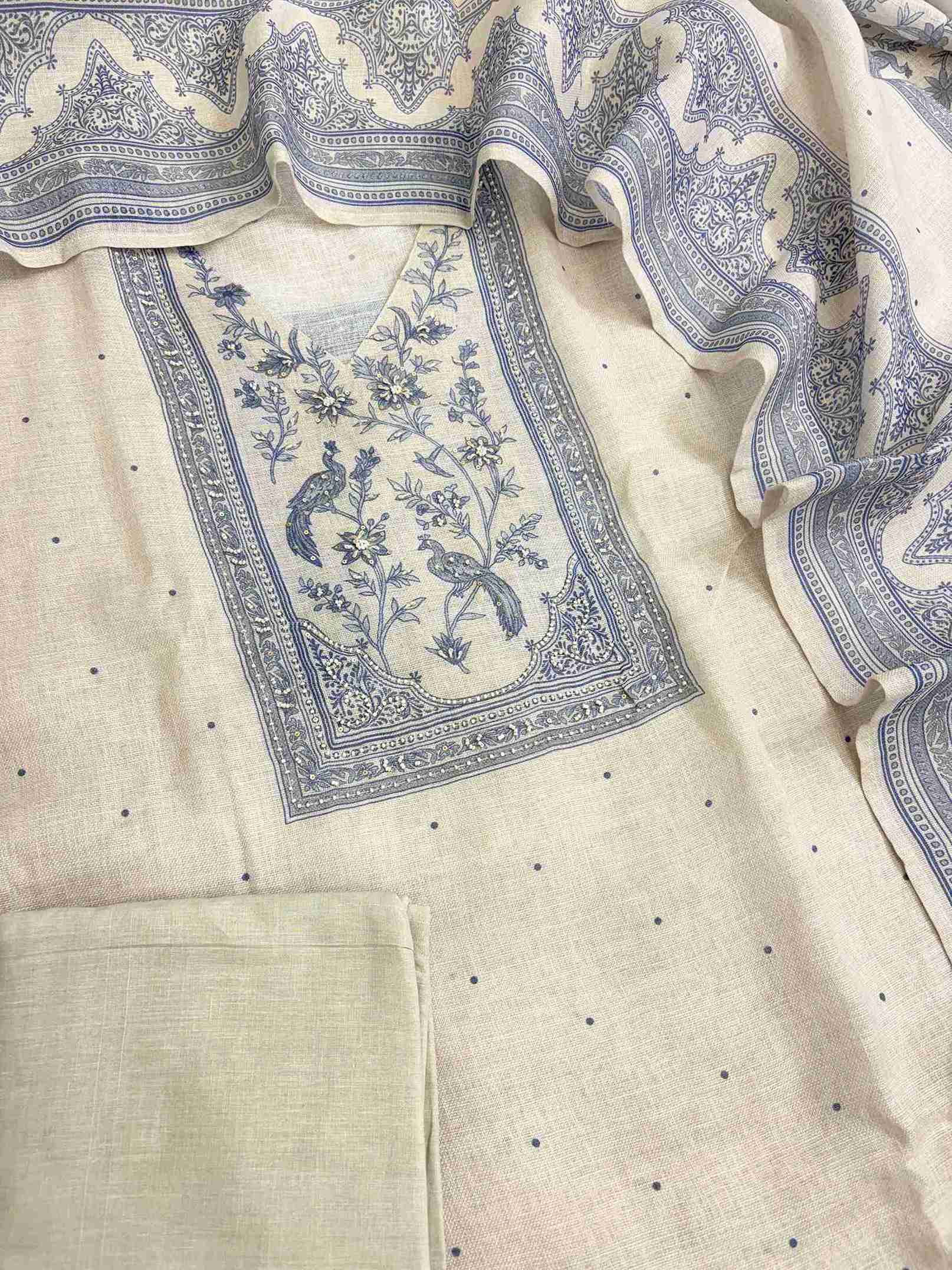 Pearl grey linen unstitched suit full front view worn by model with broad stripe pattern dupatta draped
