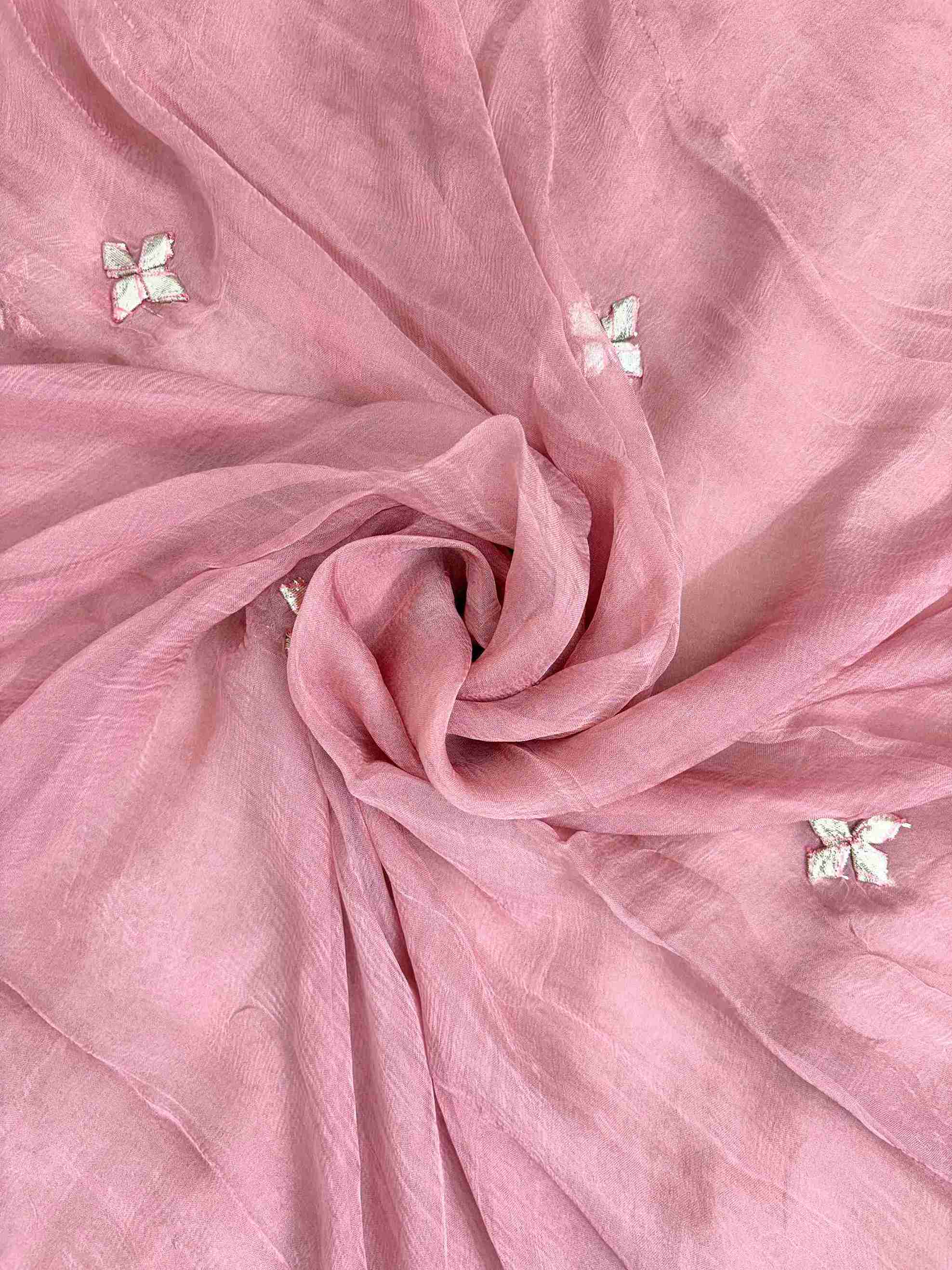 Bota lace border and scattered gota floral motifs across pink chiffon dupatta surface