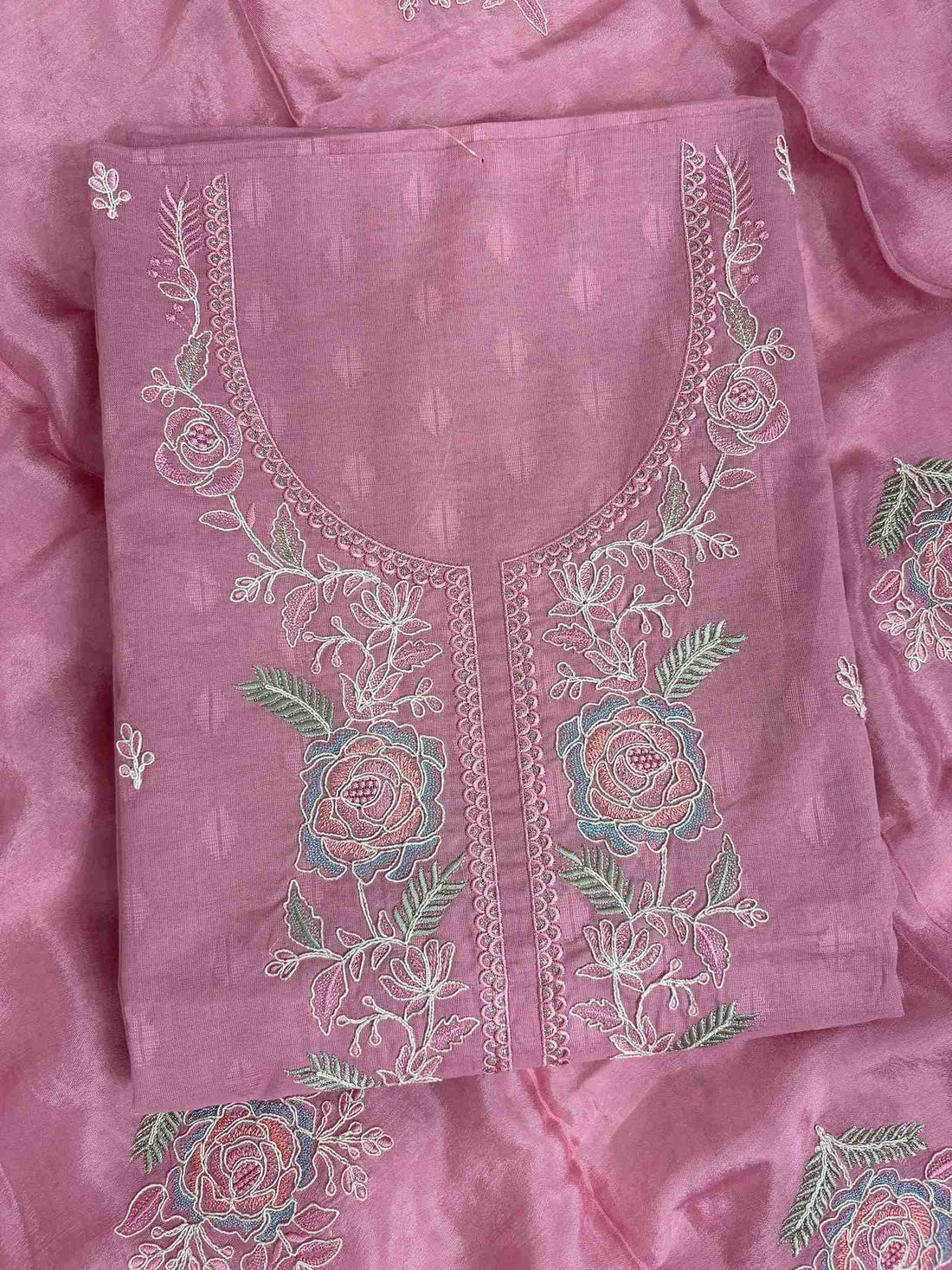 Floral embroidered booti detail on mustard yellow cotton unstitched suit