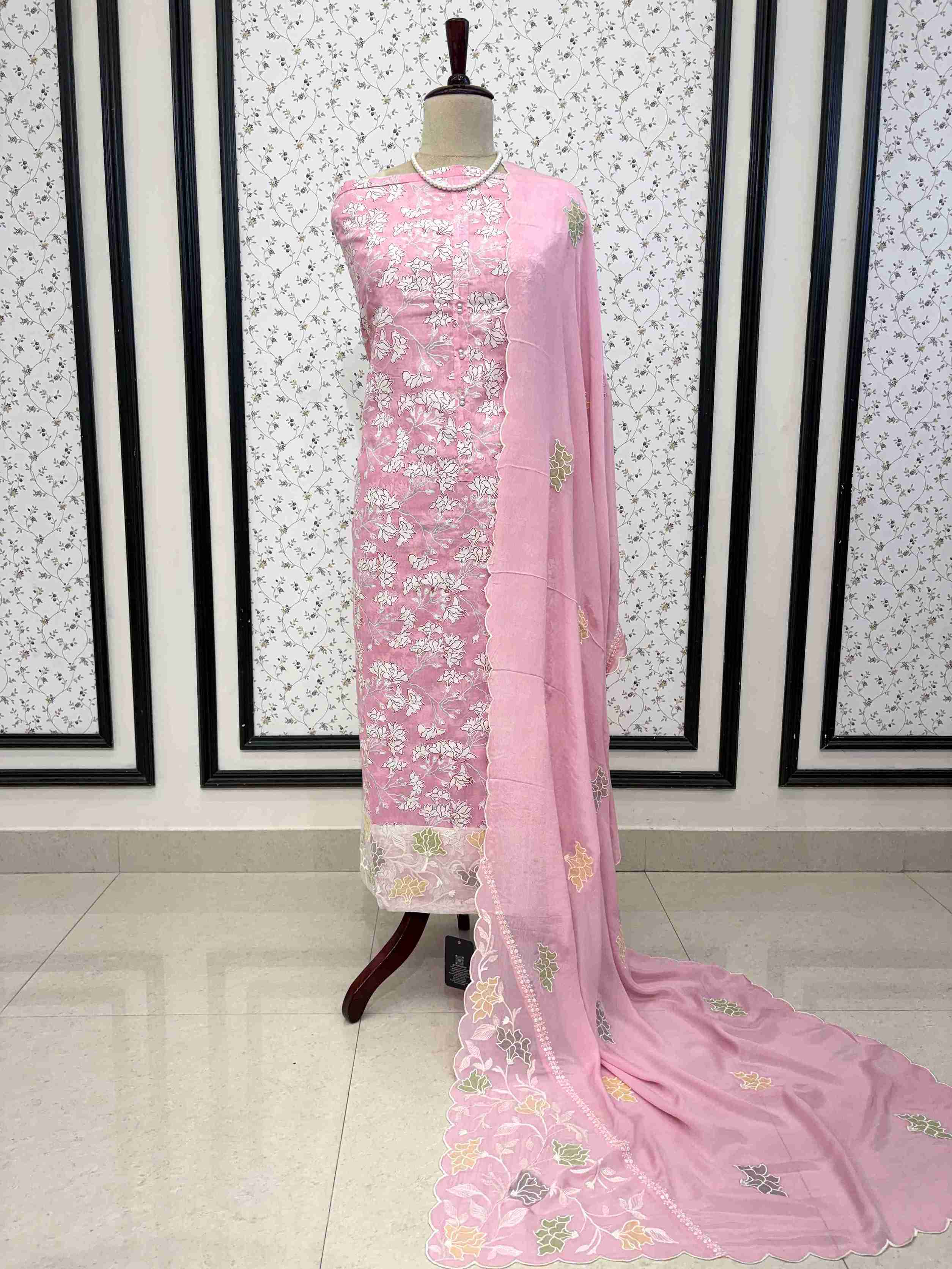 Contrasting cotton bottom detail with abstract streak print paired with pink cotton suit