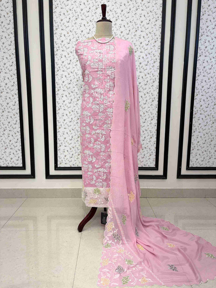 Contrasting cotton bottom detail with abstract streak print paired with pink cotton suit