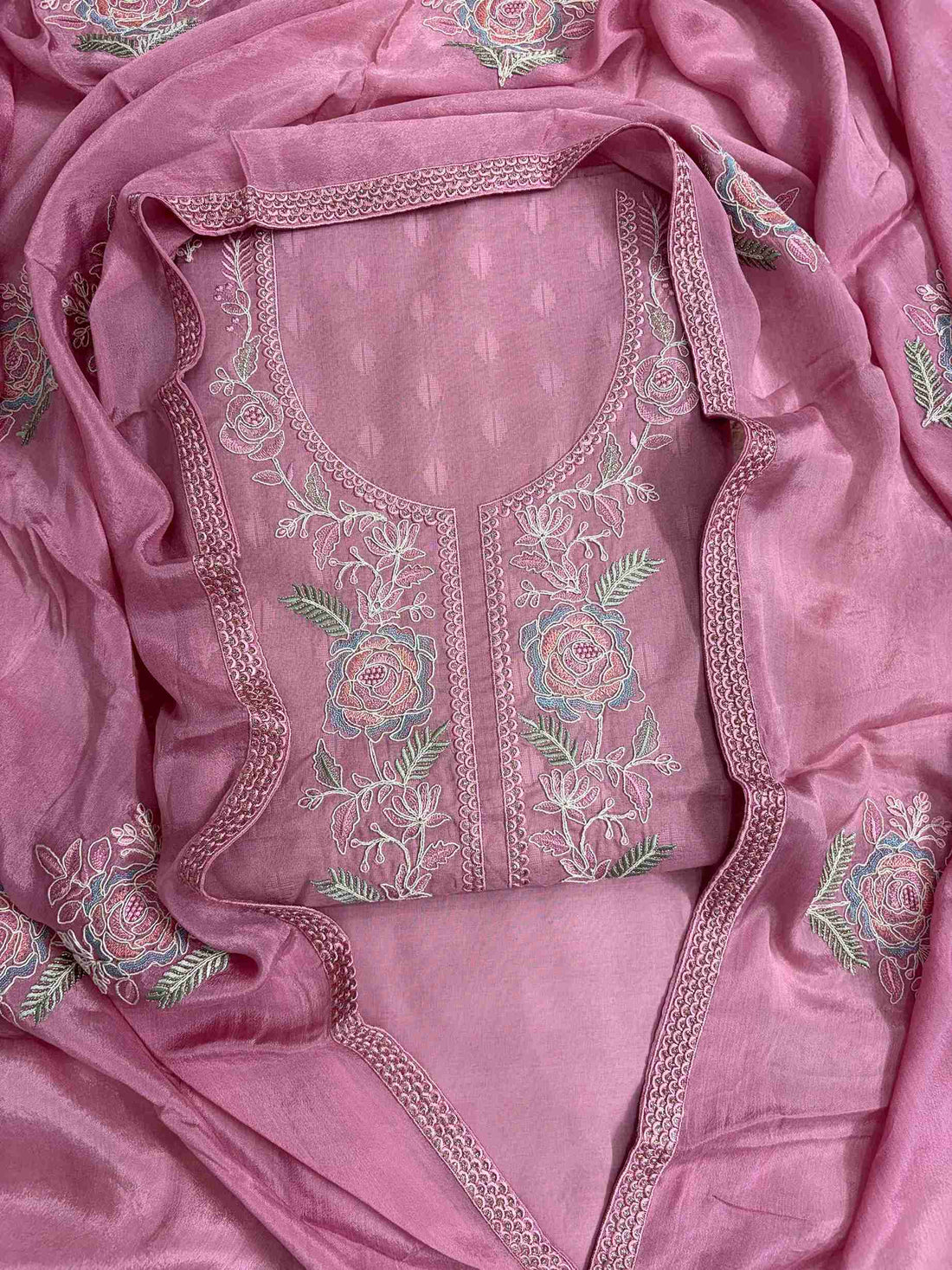 Pink cotton unstitched suit with floral embroidered neckline flatlay