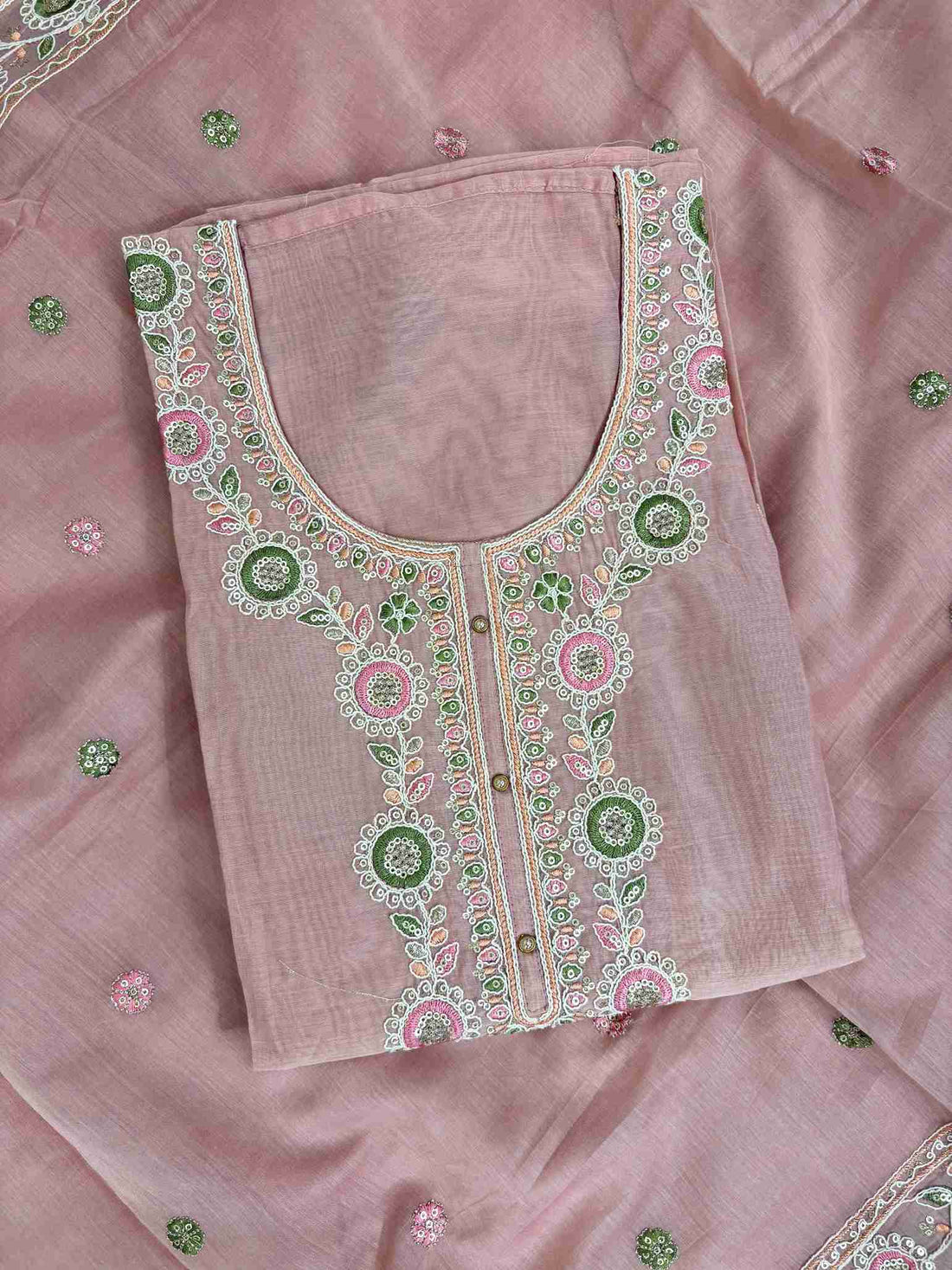 Multicolor thread embroidered floral motifs with mirror work at neckline and front placket of lemon yellow mul chanderi shirt
