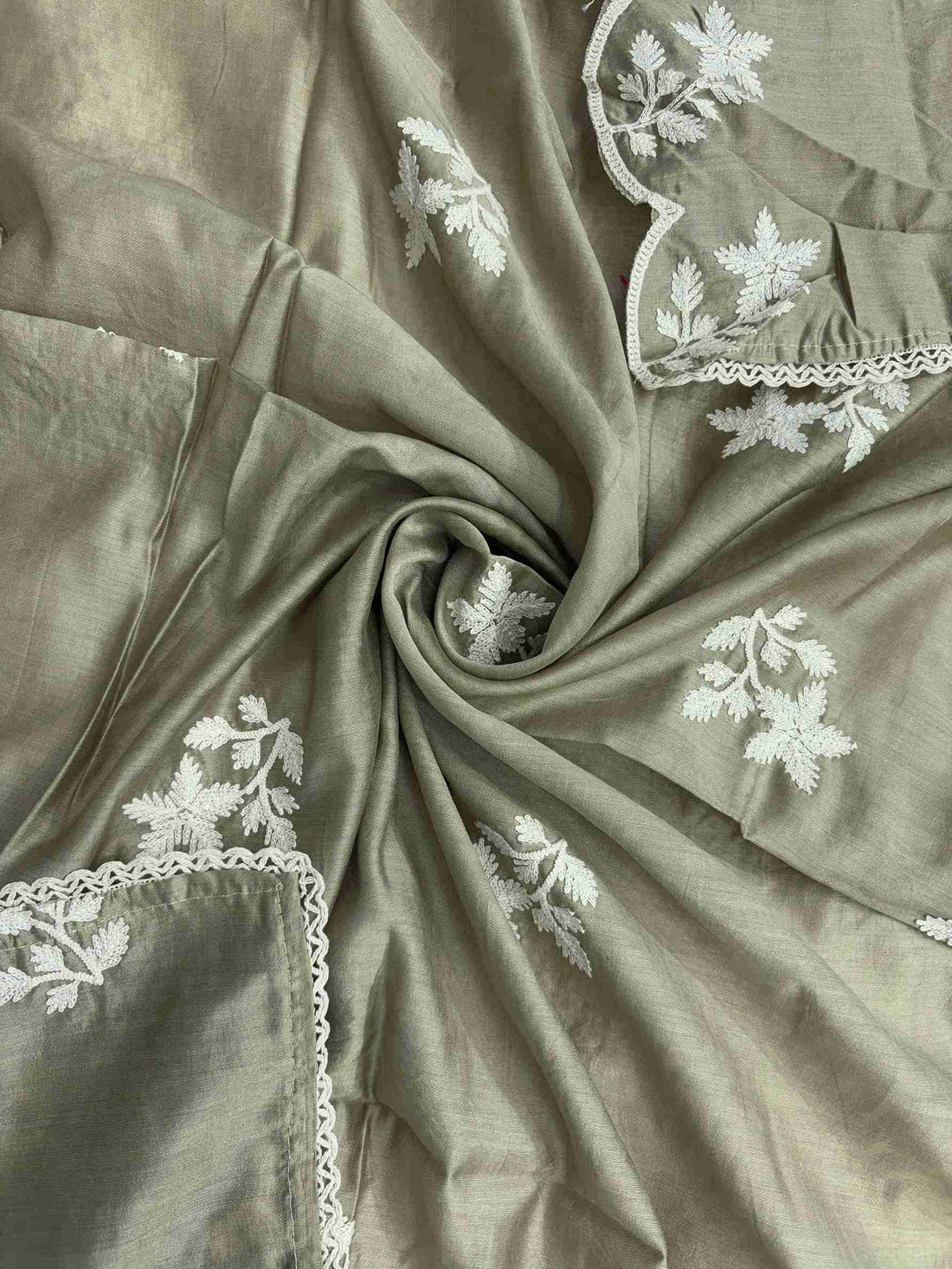 All-over crotia embroidered floral and vine motifs across greyish blue jaam cotton dupatta surface