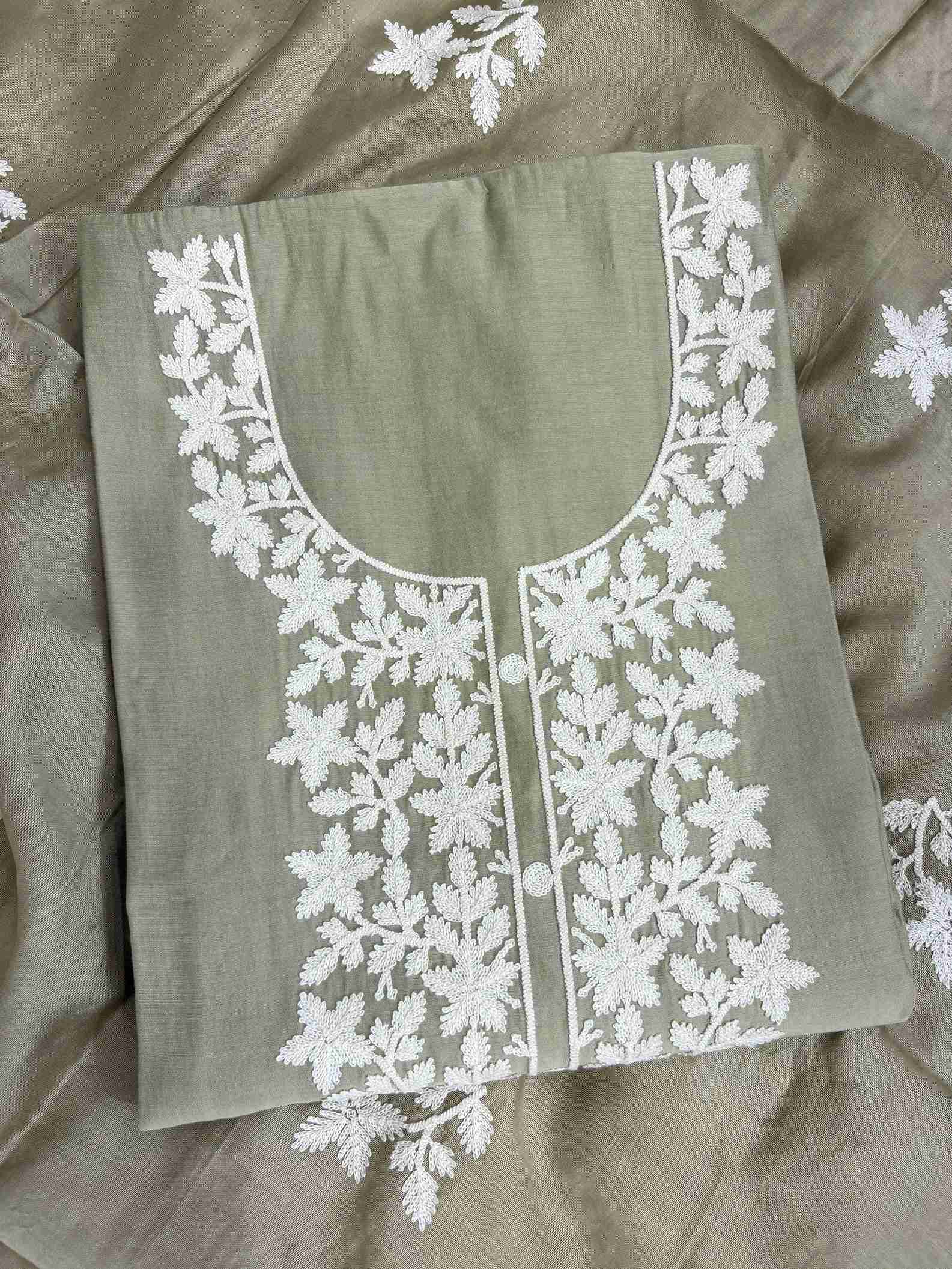 Crotia embroidered round neckline and front placket panel detail on pista green jaam cotton shirt