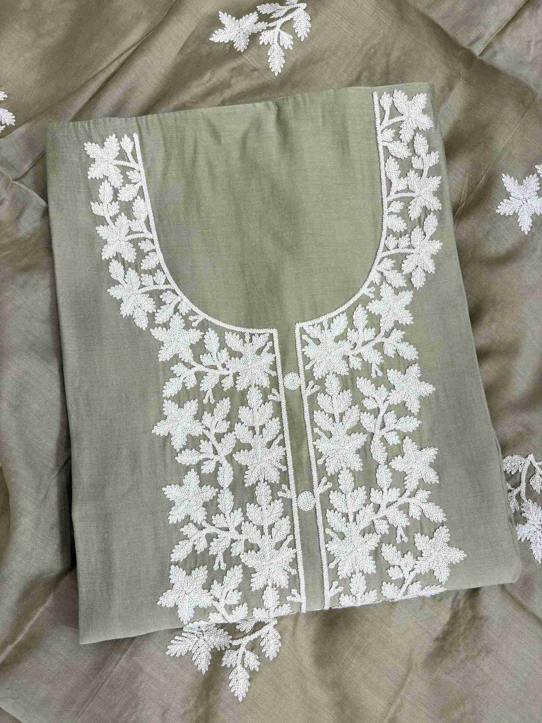 Crotia embroidered round neckline and front placket panel detail on pista green jaam cotton shirt