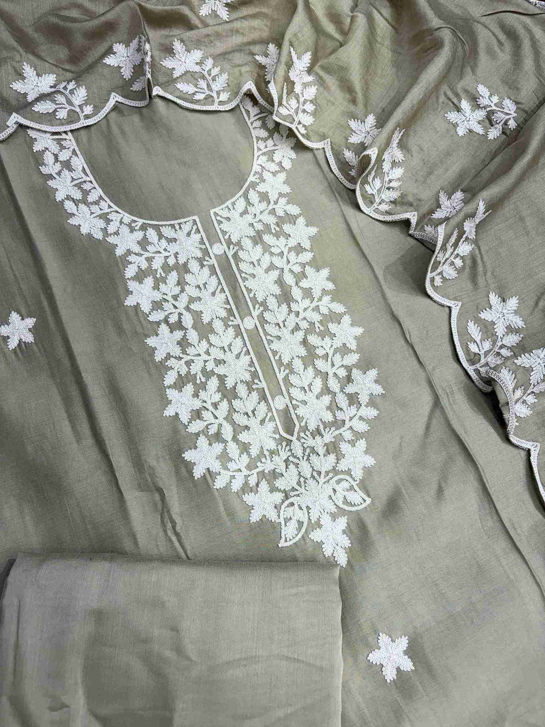 Complete pista green jaam cotton unstitched suit flat lay set with shirt, dupatta, and matching bottom