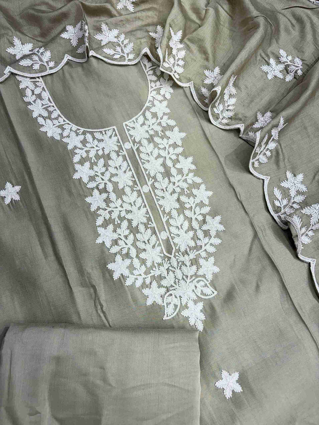 Complete pista green jaam cotton unstitched suit flat lay set with shirt, dupatta, and matching bottom
