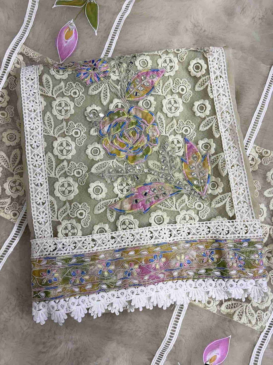 White lace panels running across the full length of pista green organza shirt body