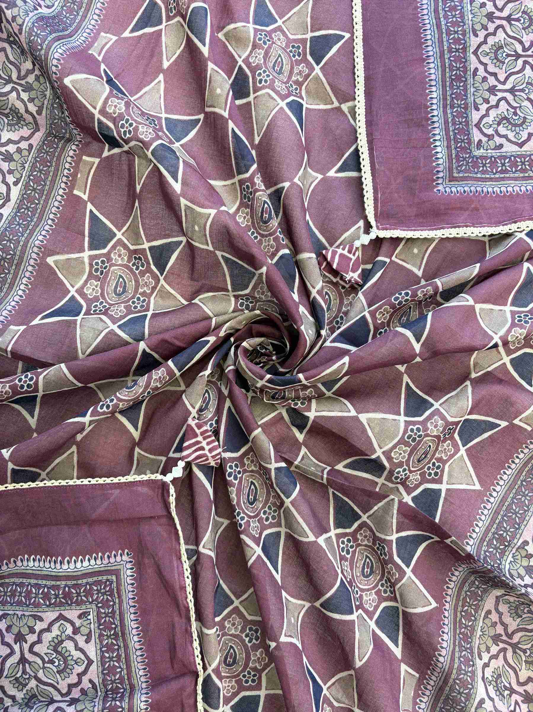 Large-scale digital geometric star print with coordinating borders and crotia lace edge on plum cotton dupatta