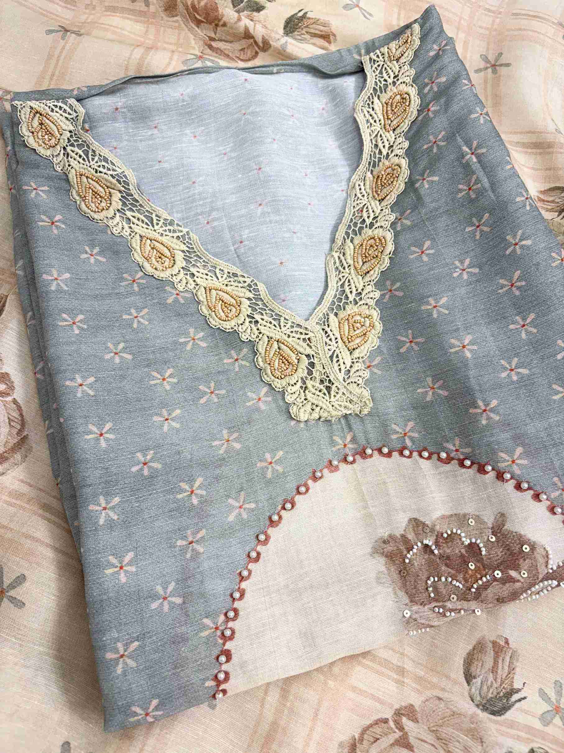 V-neckline with crotia lace highlighting on powder grey linen cotton shirt