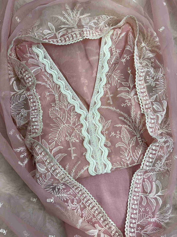 Powder pink poly chiffon suit front view with resham embroidery and lace V neckline