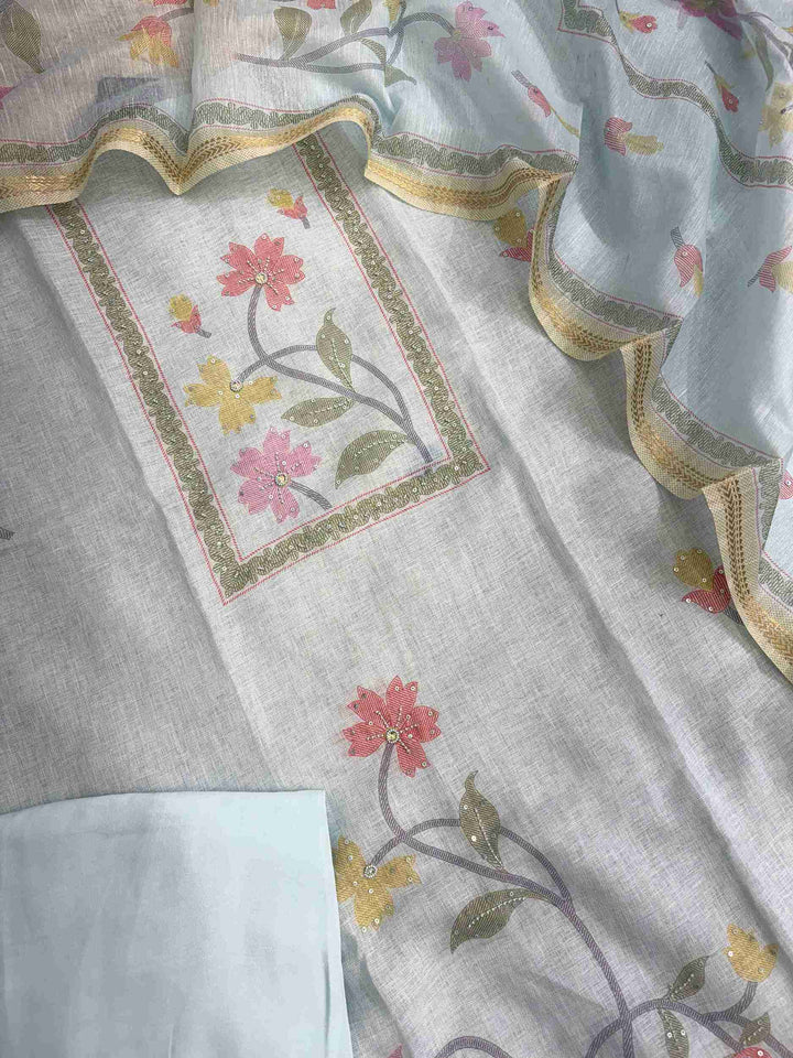 Linen cotton powder blue suit featuring deep rectangular neckline with floral vines