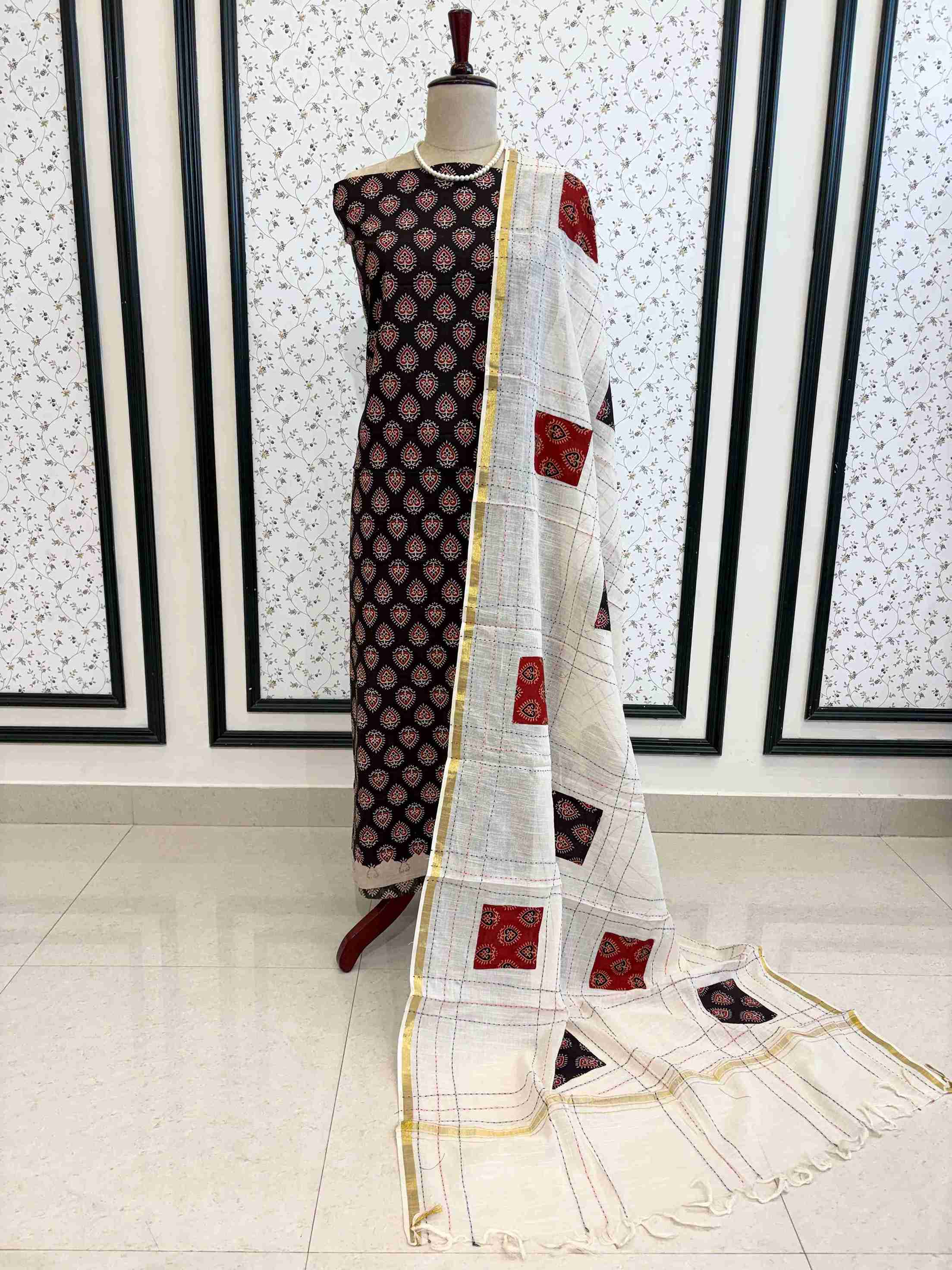 Pure cotton black handblock printed unstitched suit set with applique patch dupatta displayed on mannequin