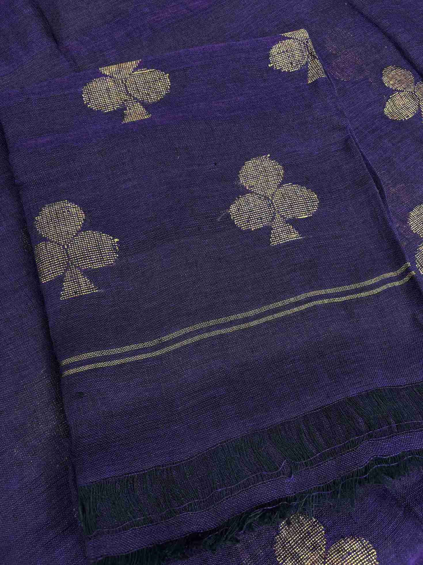 Natural slub texture and organic weave of purple handloom linen shirt fabric close-up