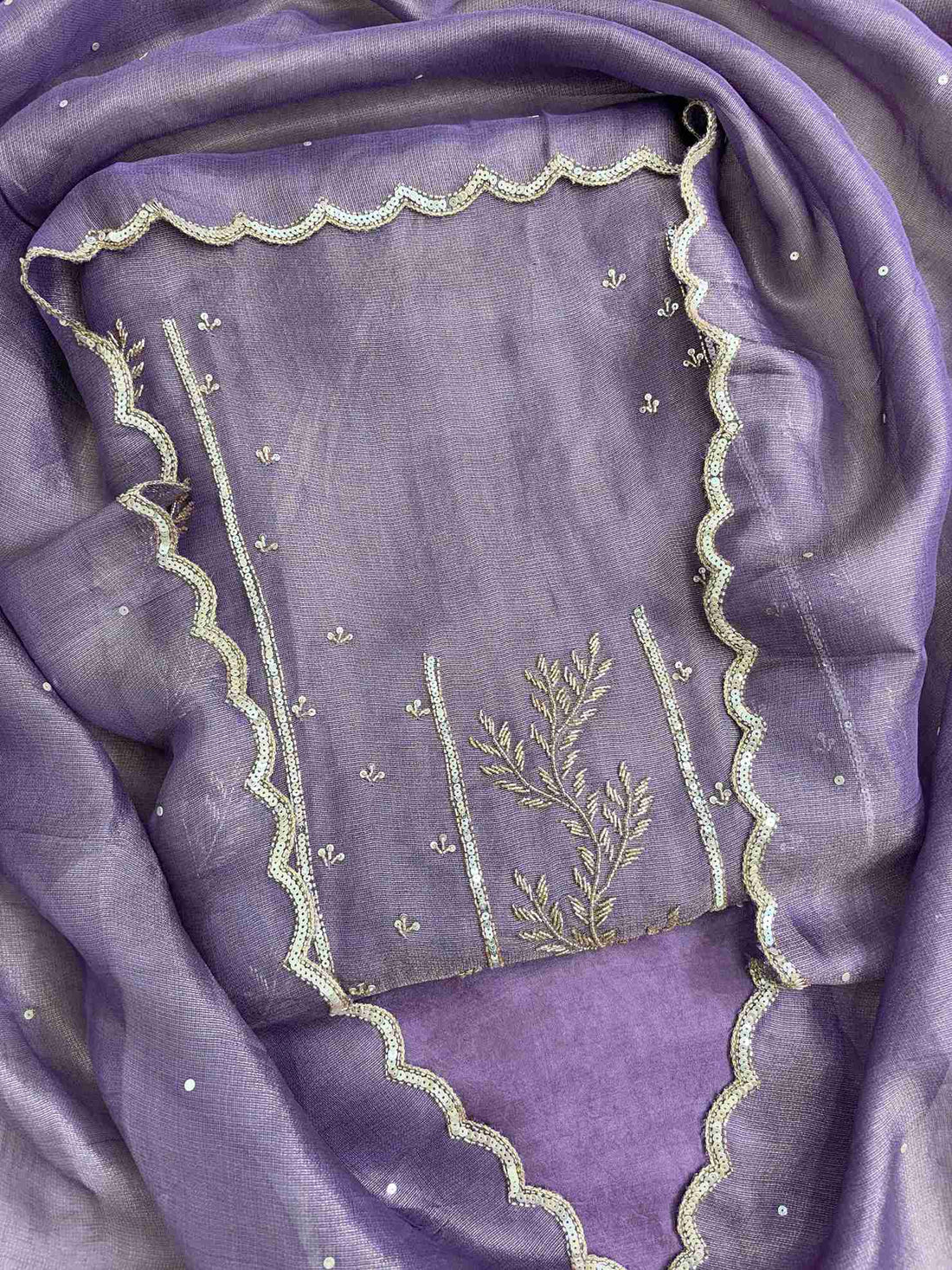 Front view of purple burberry tissue suit with intricate sequence and nalki work