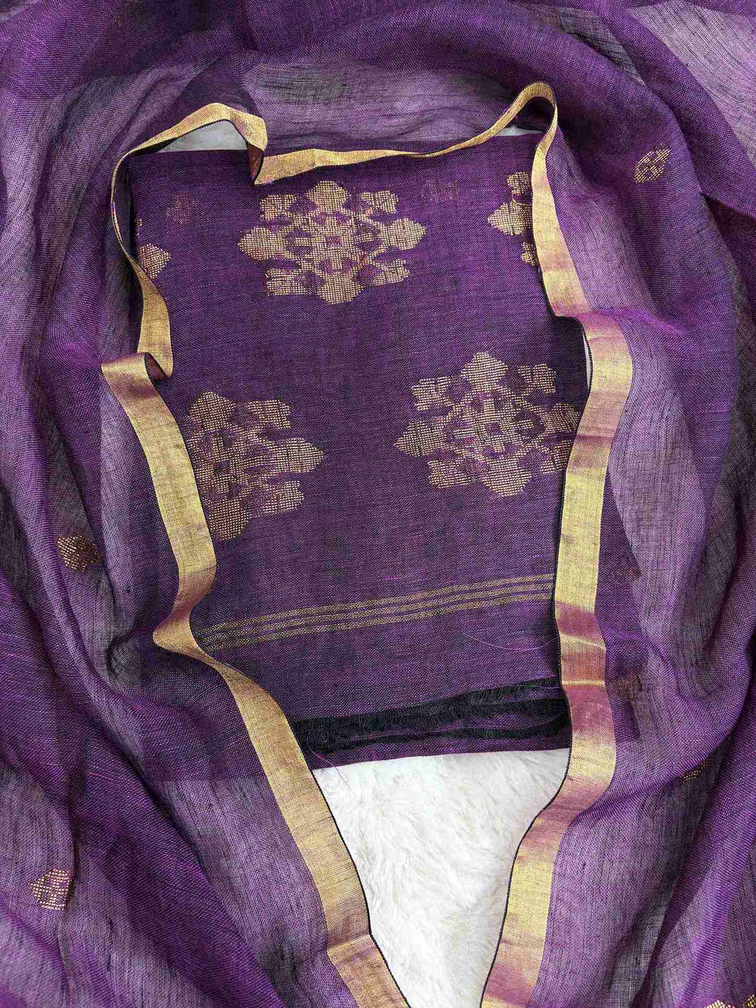 Scattered golden woven floral cluster motifs across purple pure handloom linen shirt body