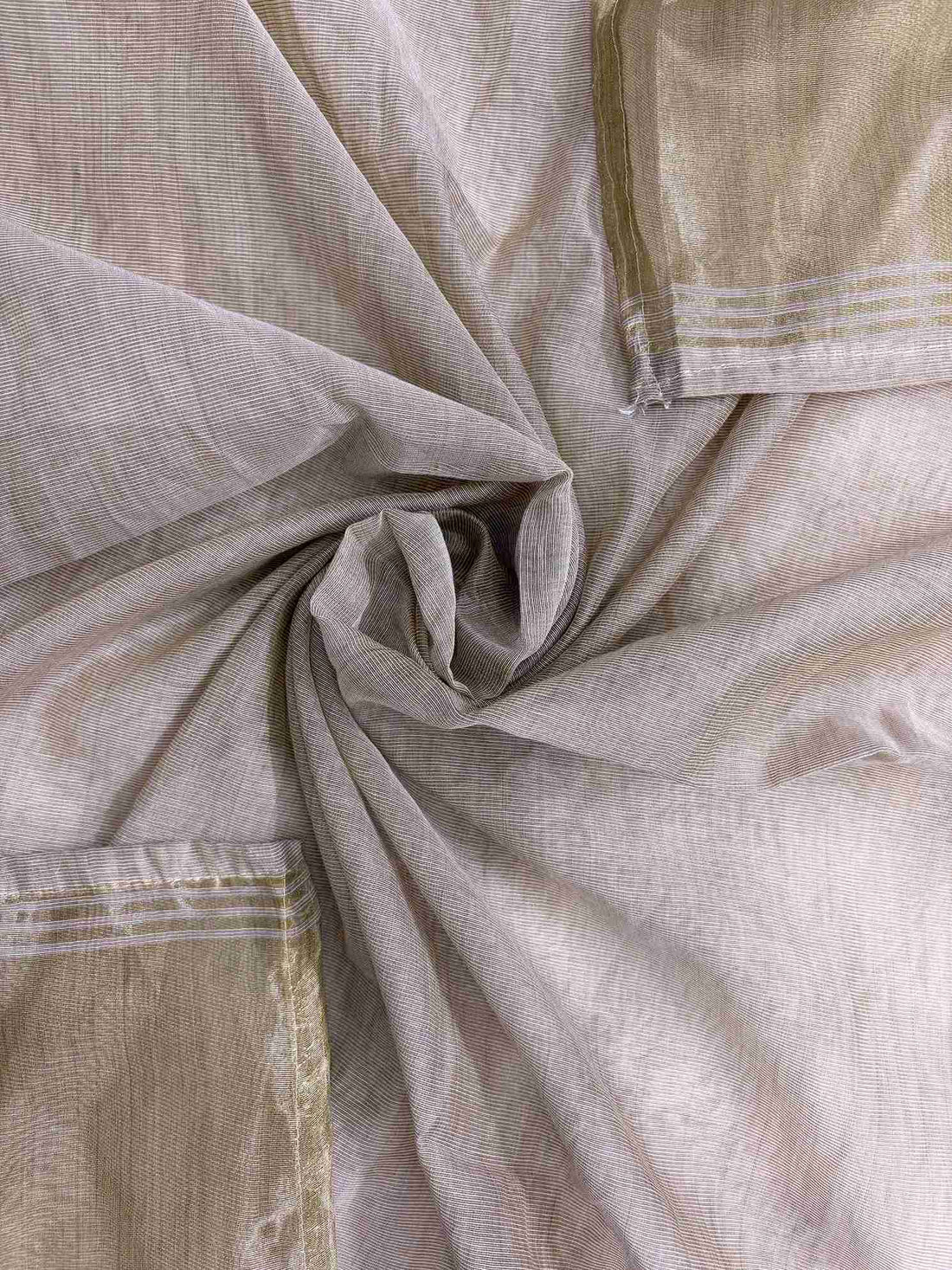 Broad gold zari patta along shorter sides of rose-gold jamdani cotton dupatta