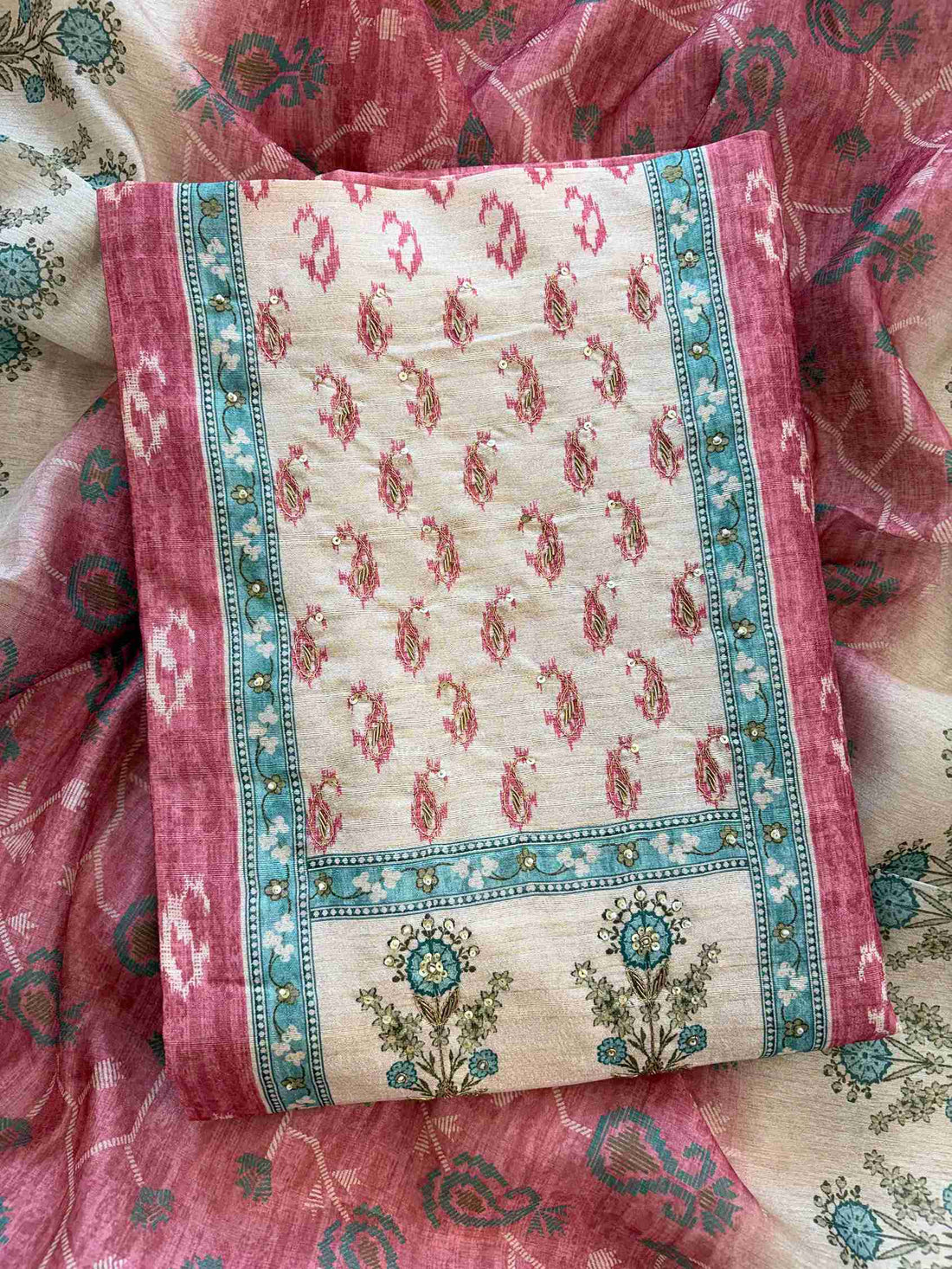 Floral motif print border on the hemline of rose pink Chanderi suit