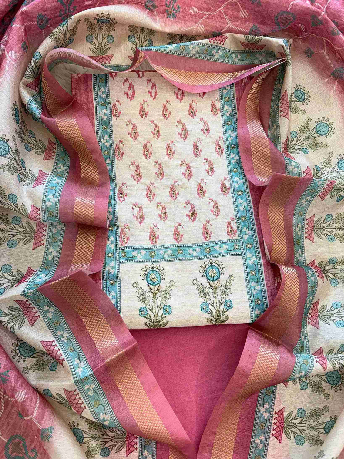 Close-up of contrast yoke with floral pot motif on rose pink Chanderi suit