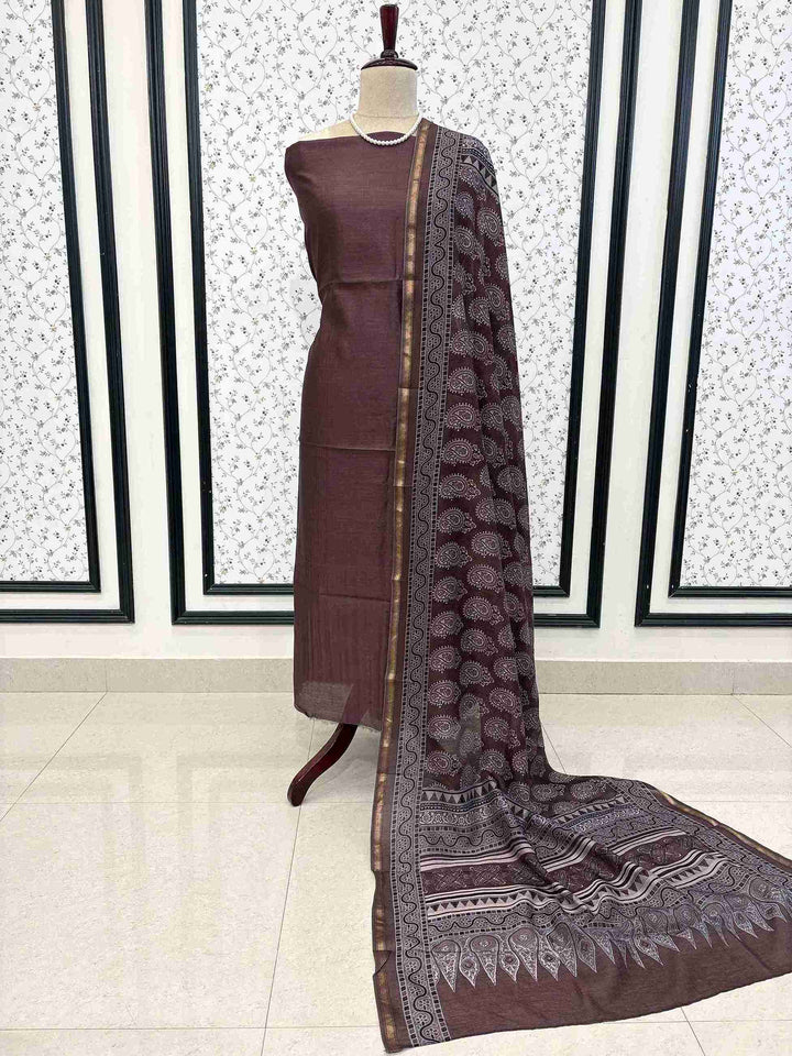 Full unstitched Rosewood Brown silk suit set with Ajrakh dupatta and cotton bottom
