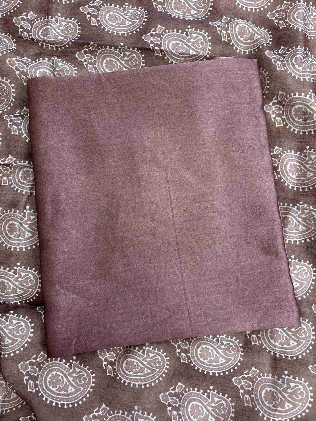 Close-up of digitally printed Ajrakh style dupatta on Rosewood Brown silk suit