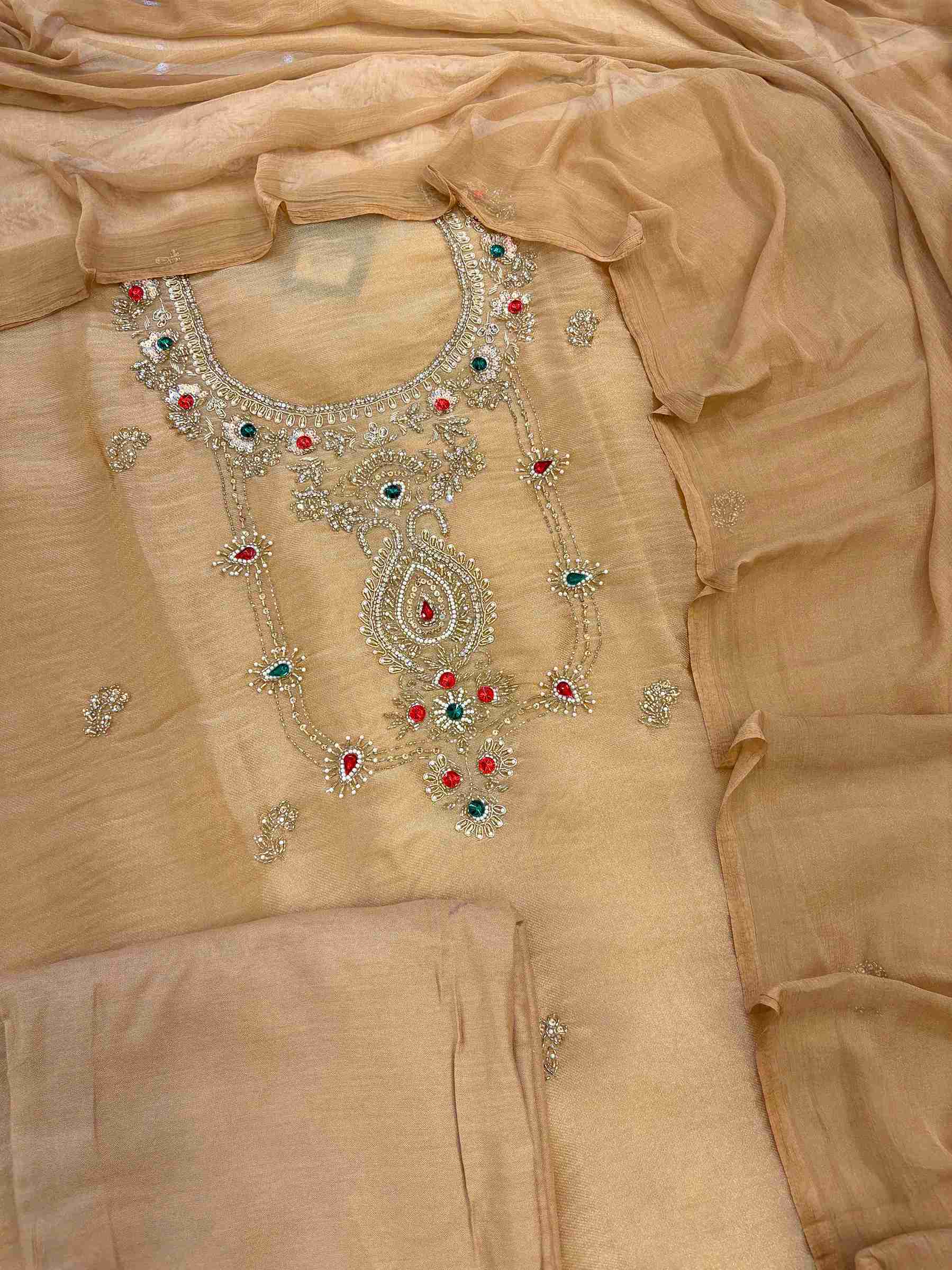 Rust brown simmar tissue unstitched suit set flatlay with dupatta and bottom