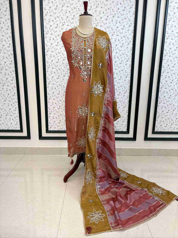 Rust pink shimmer tissue unstitched suit with mirror work on manequinn