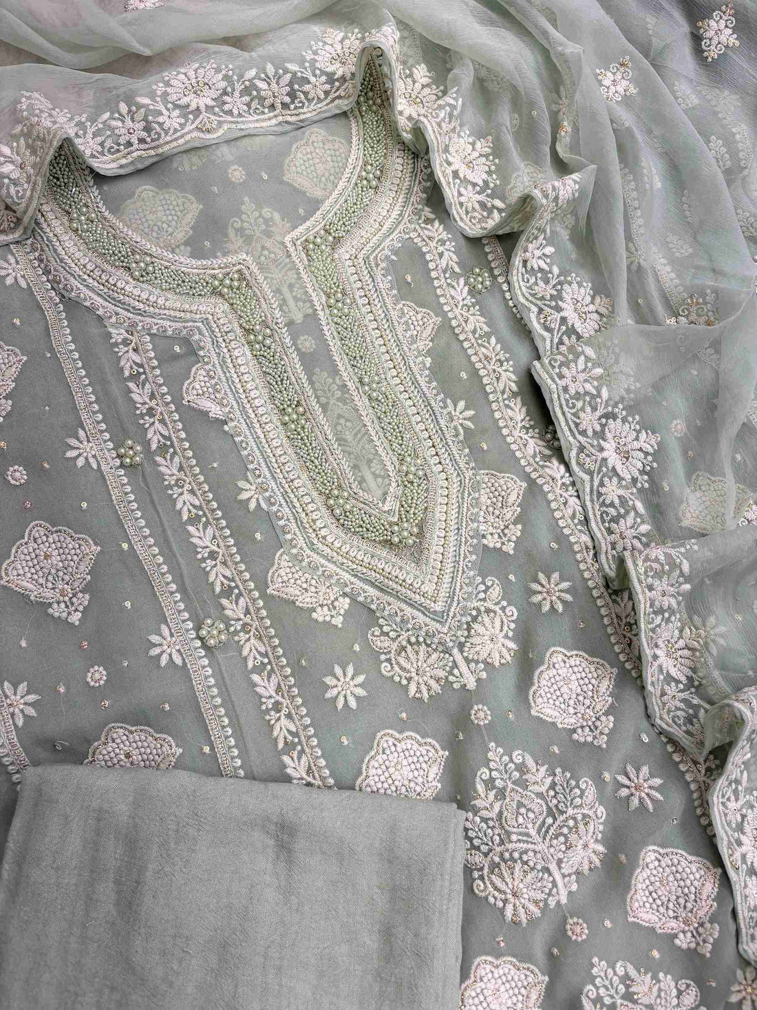 Sage green georgette shirt featuring all-over chikankari embroidery with panel design