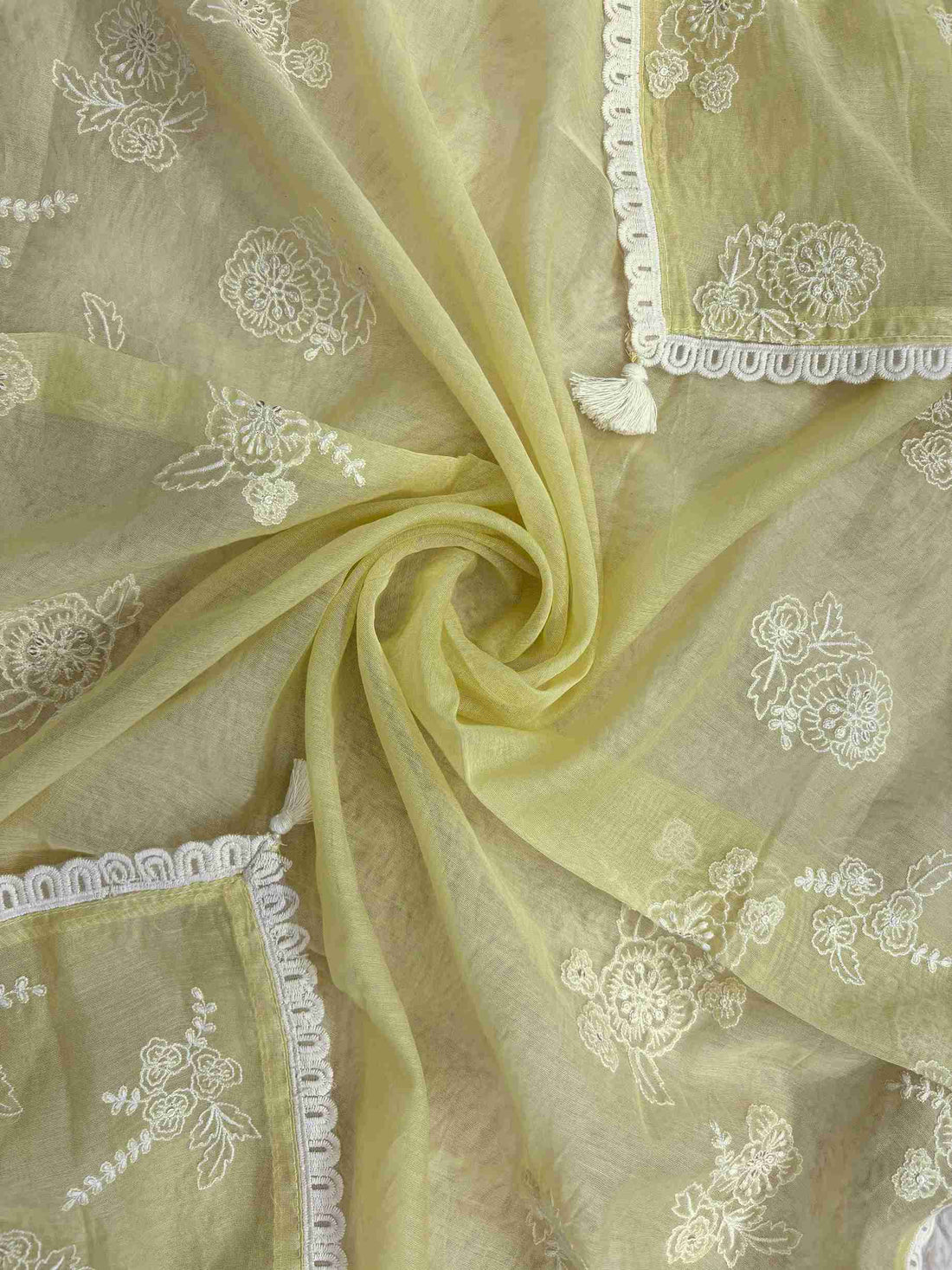 Broad lace border at hemline of sage green mul chanderi unstitched shirt