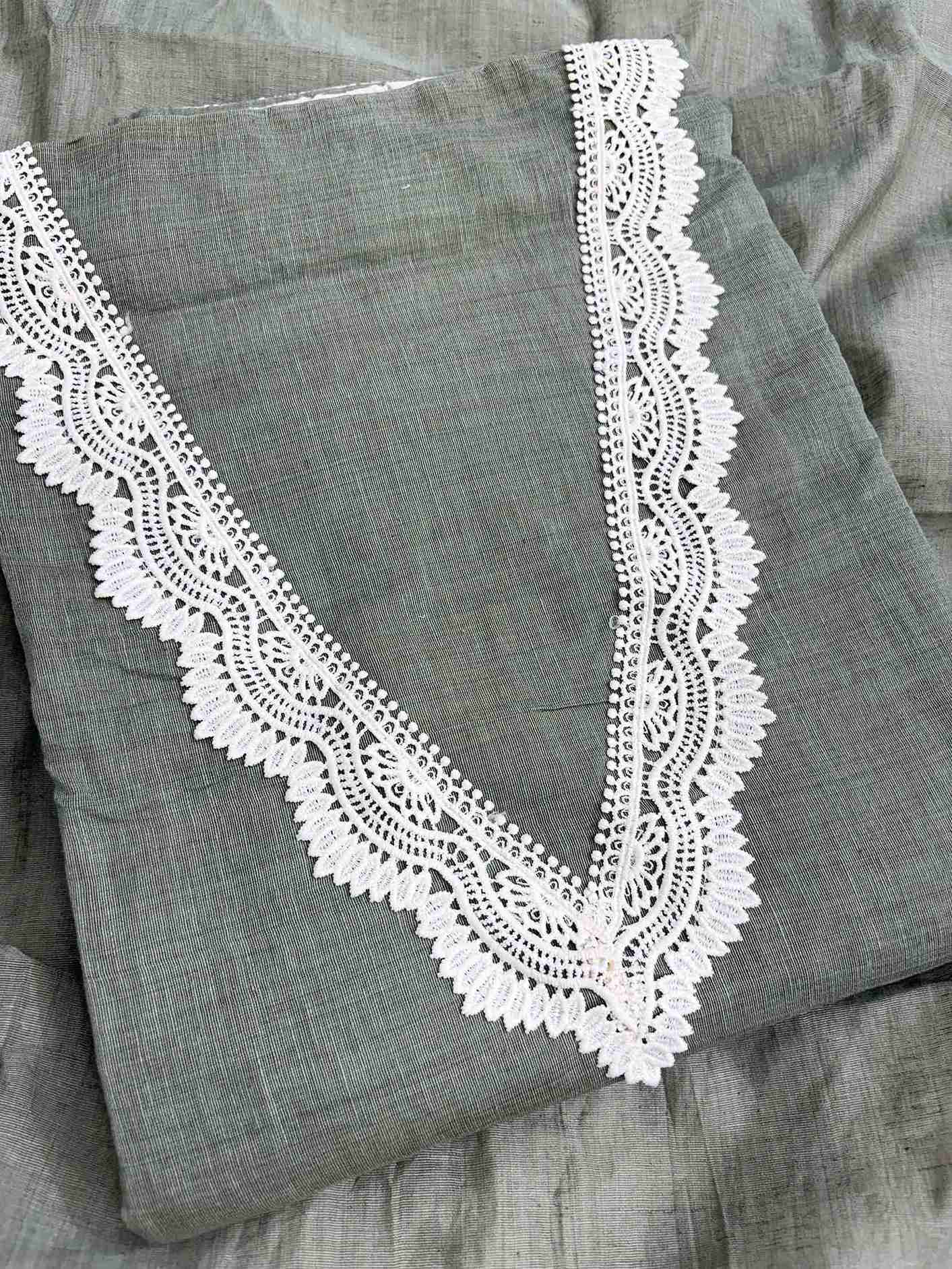 V-neckline detail with crotia lace finishing on sage green mul chanderi shirt