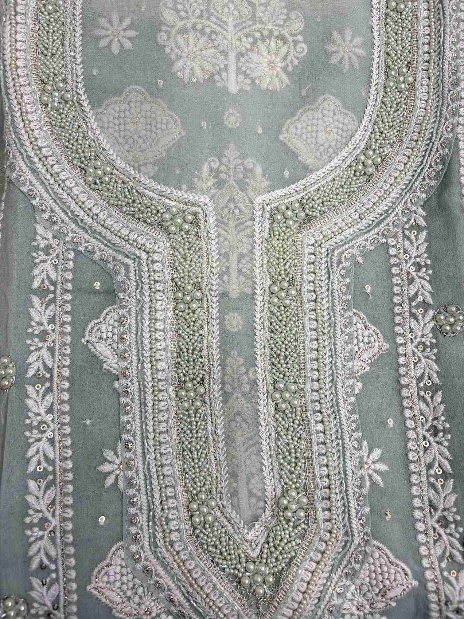 Sage green chikankari suit neckline