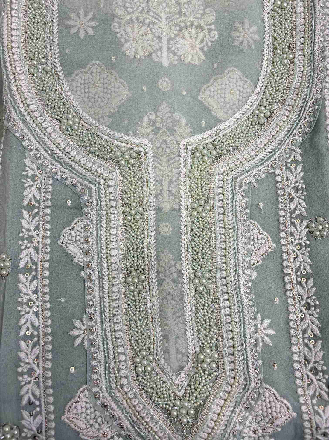 Sage green chikankari suit neckline