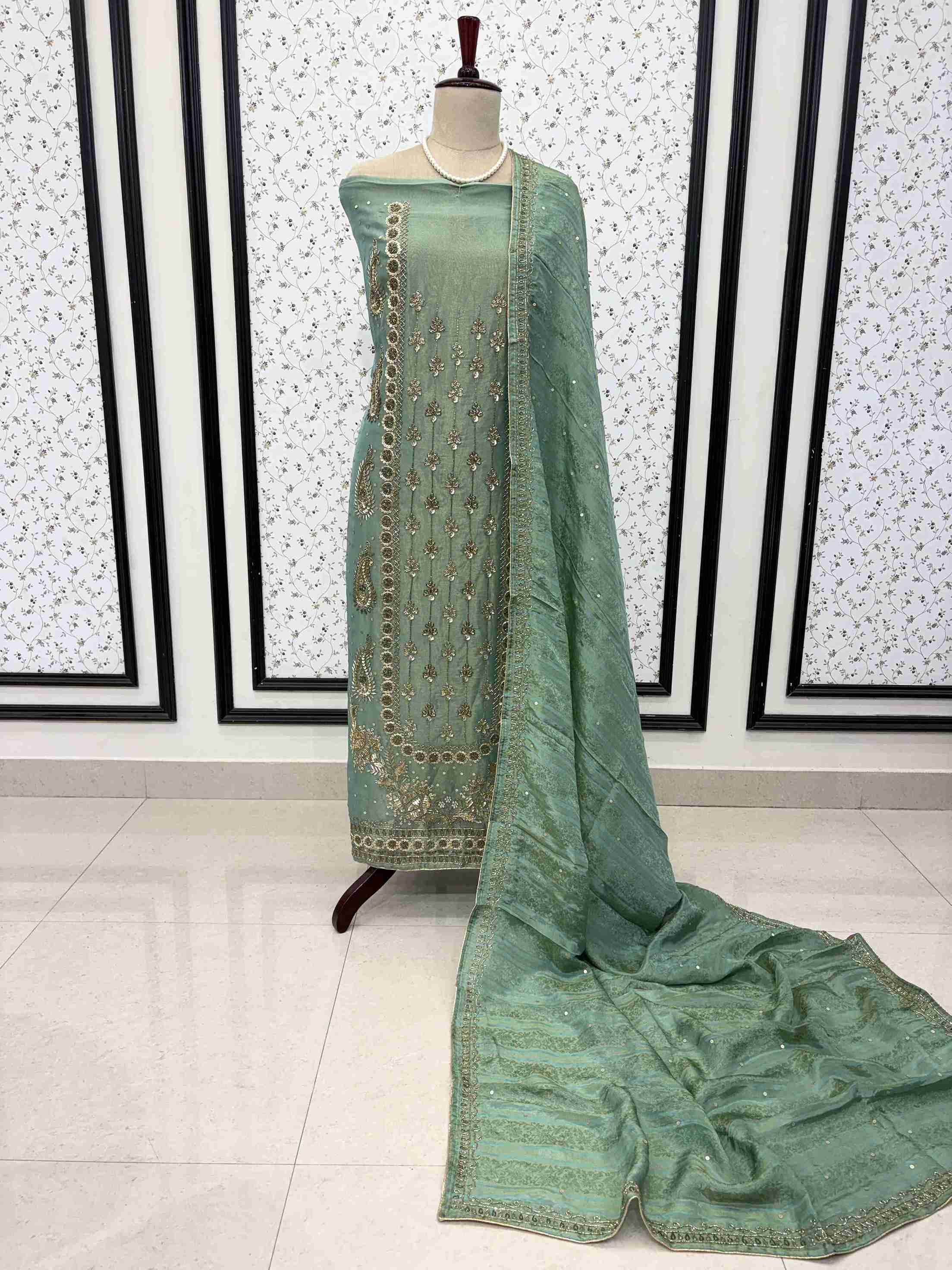 Shimmer organza dupatta featuring elegant nalki embroidered borders on manequinn