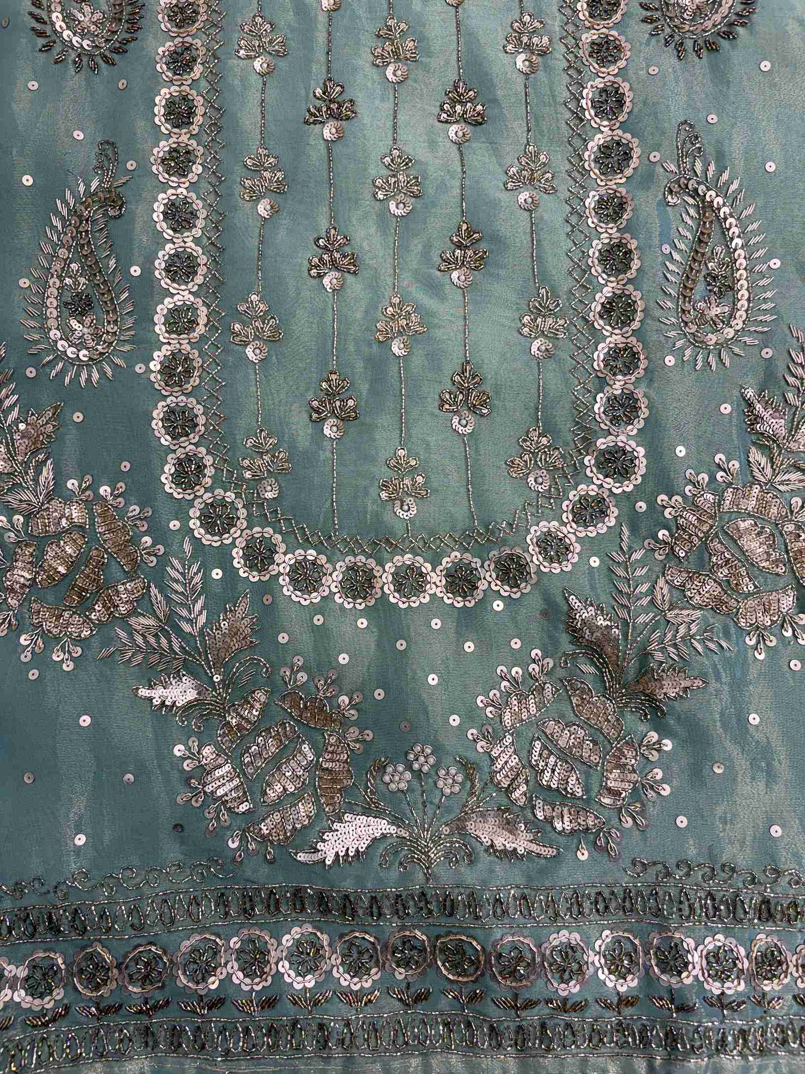 Detailed neckline embroidery with heavy hand nalki and sequence work on shimmer organza