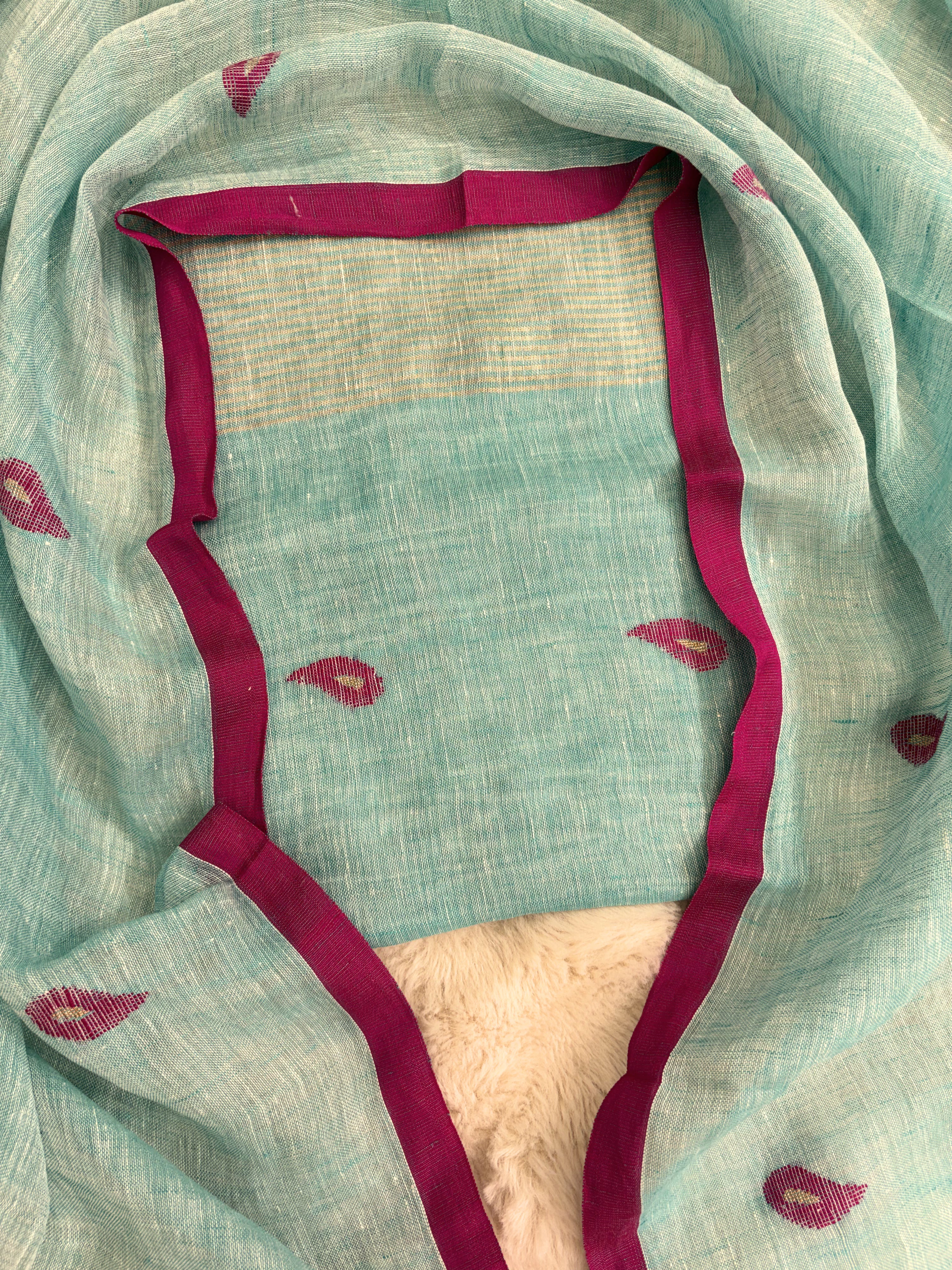 Thin golden stripe band at daaman hemline of seafoam mint linen unstitched shirt