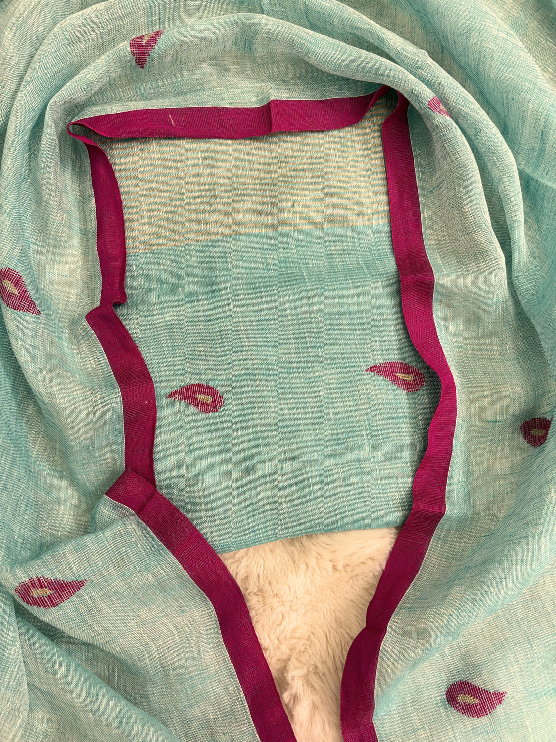 Thin golden stripe band at daaman hemline of seafoam mint linen unstitched shirt