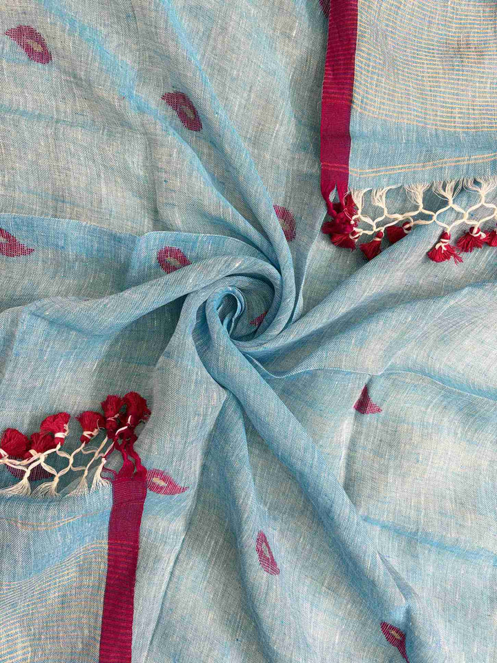 Scattered small pink paisley woven motifs across sky blue linen dupatta surface