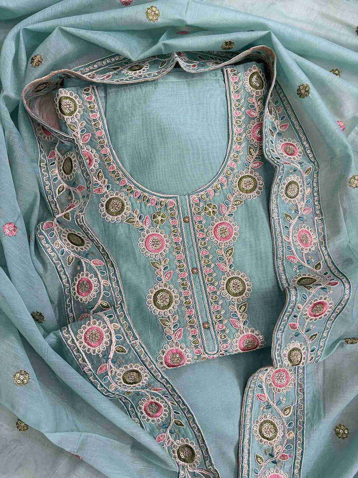Scalloped crotia lace border finishing at hemline of sky blue mul chanderi unstitched shirt