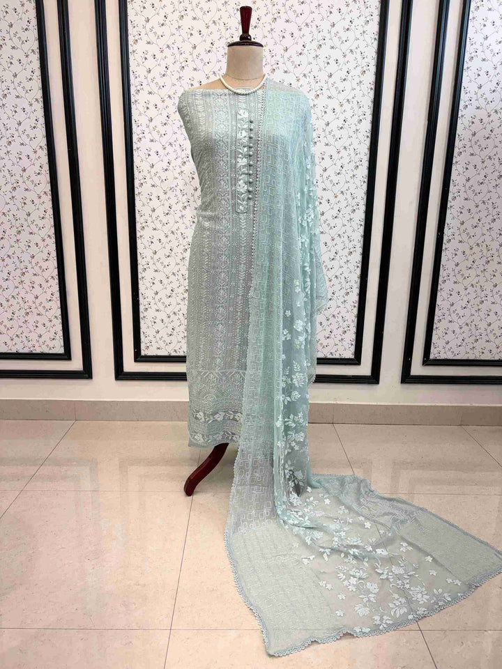 Complete soft green chikankari and applique unstitched suit set