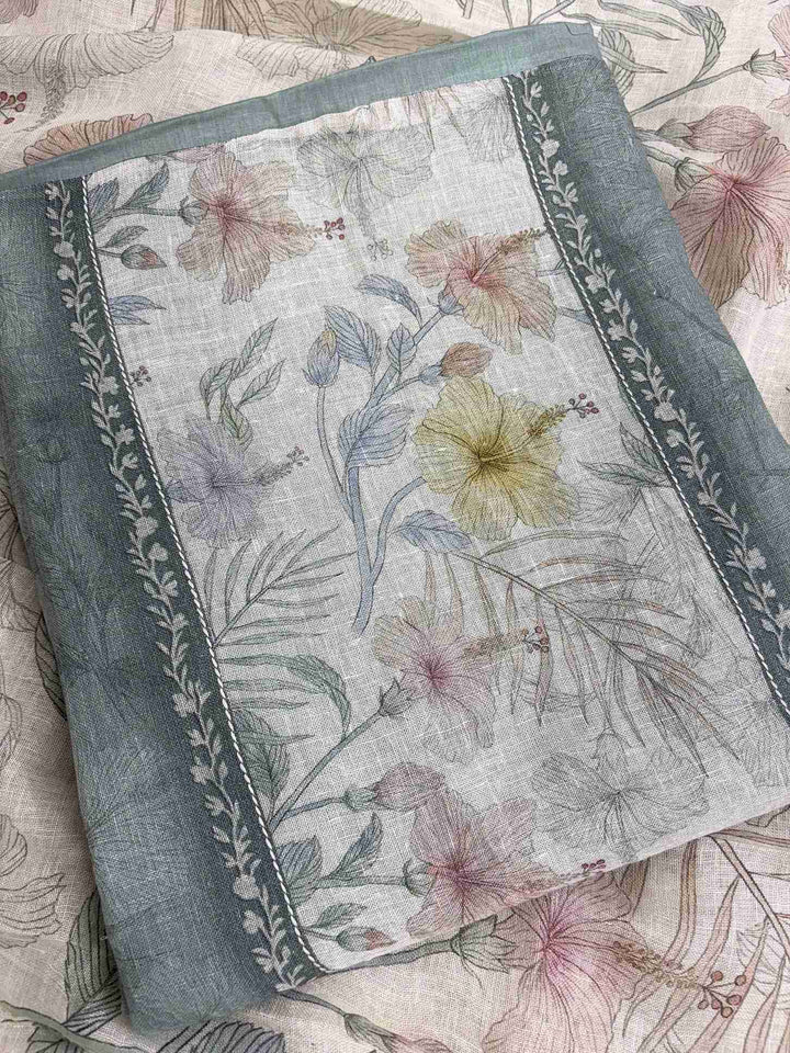 All-over tonal printed texture in soft botanical impressions across soft sage green pure linen shirt body