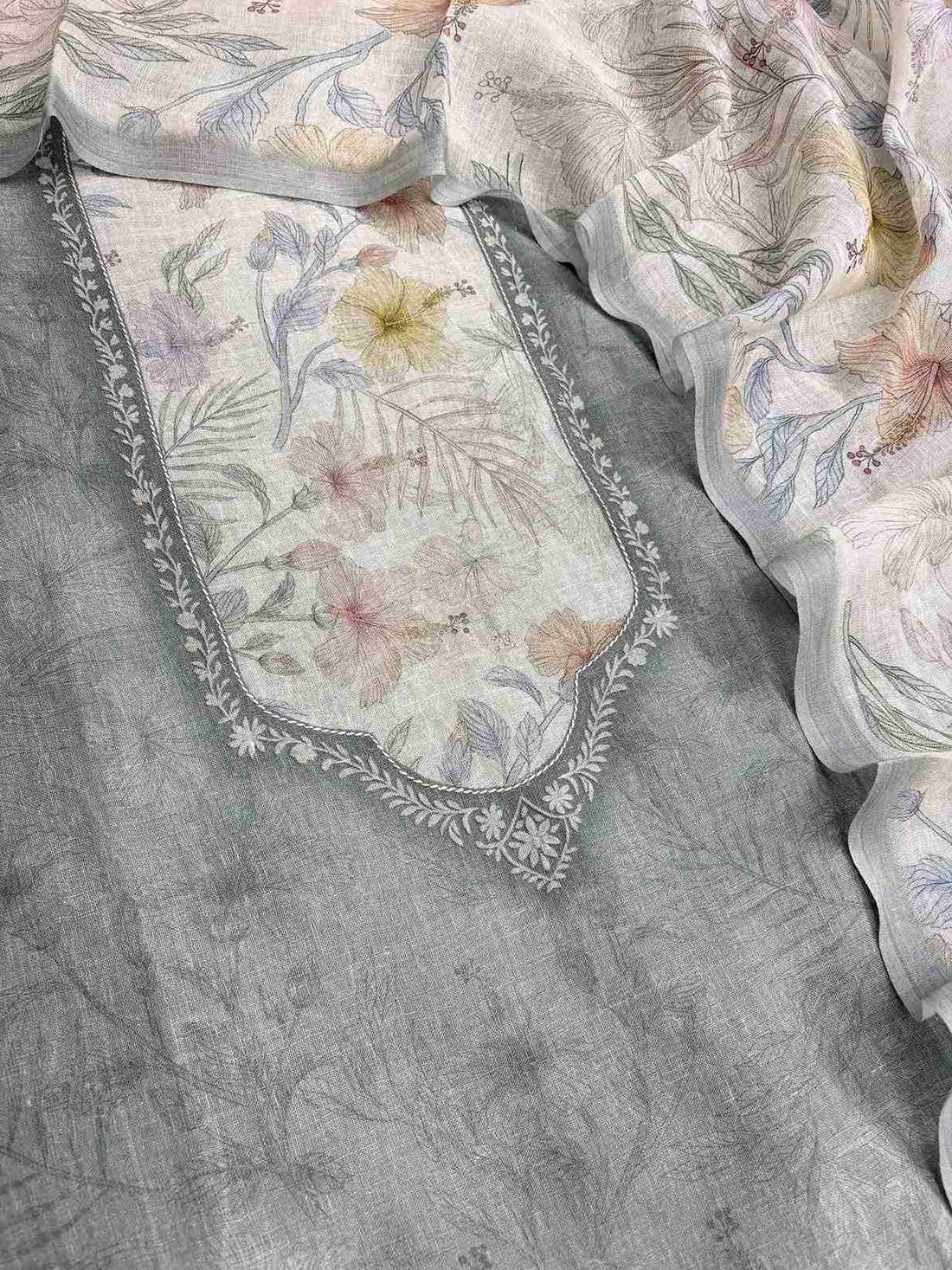 Complete soft sage green pure linen unstitched suit flat lay set with shirt, off-white floral dupatta, and cotton bottom