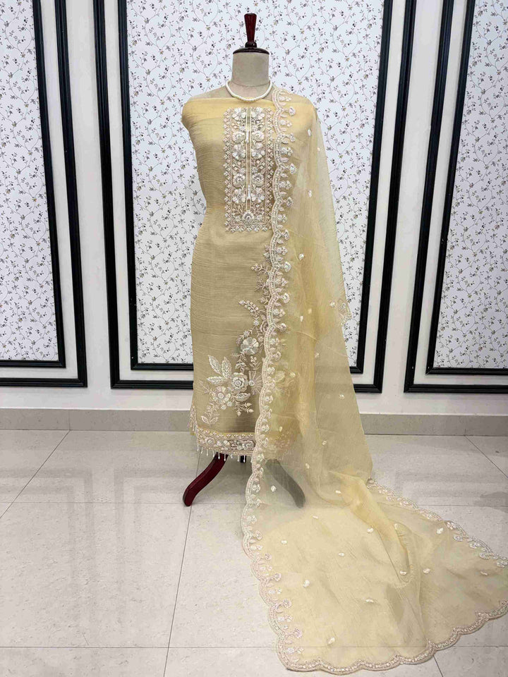Scattered floral embroidery motifs on soft yellow marble chiffon dupatta