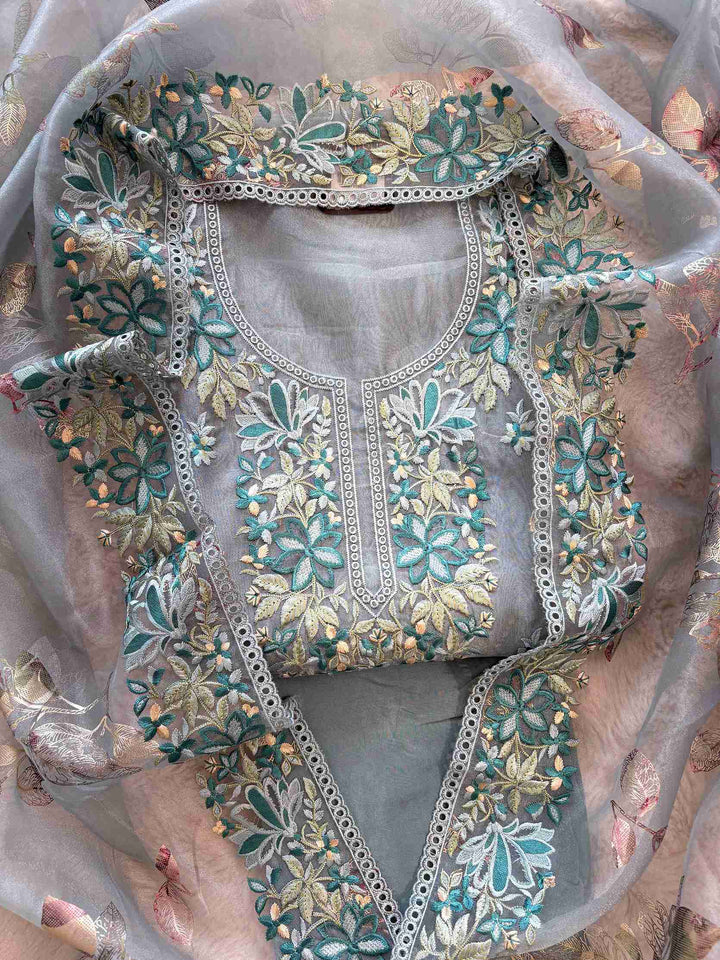 Steel Blue glass organza unstitched suit set flatlay with dupatta and opada silk bottom