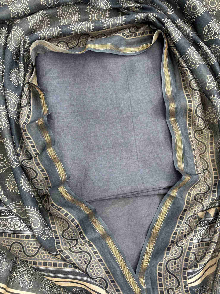 Steel blue silk suit front view with plain shirt and Ajrakh printed dupatta