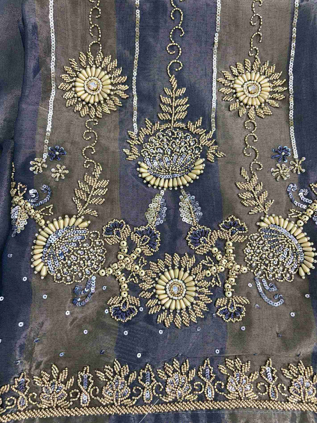 Steel blue shimmer tissue fabric featuring metallic bugle beads sequins and crystals