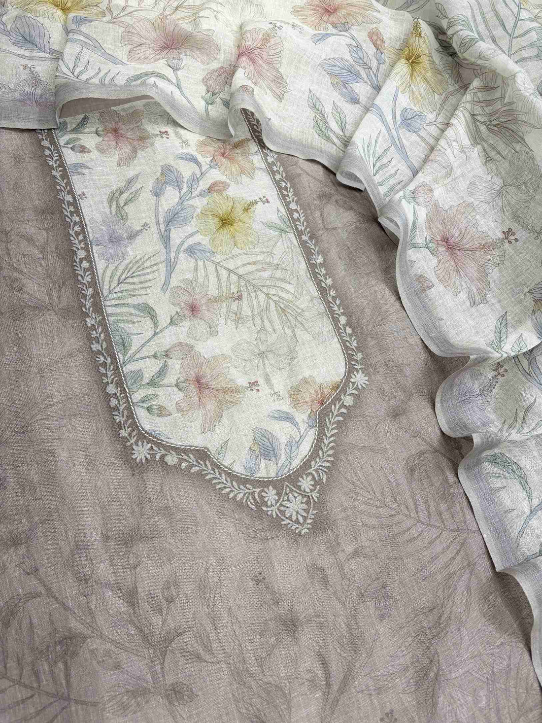 Complete taupe beige pure linen unstitched suit flat lay set with shirt, off-white floral dupatta, and cotton bottom