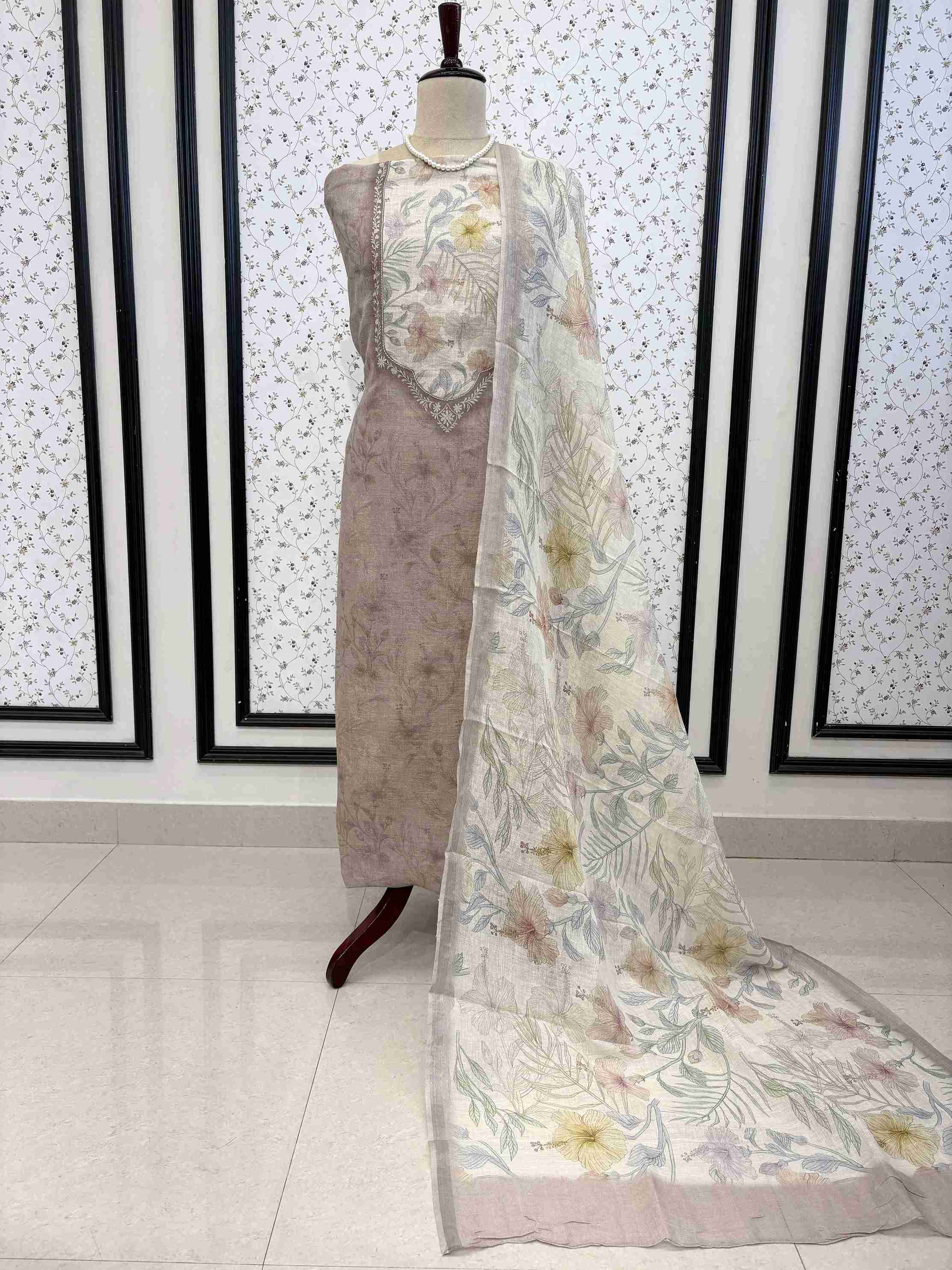 Taupe Beige pure linen unstitched suit full front view with off-white multicolor floral printed dupatta draped on mannequin