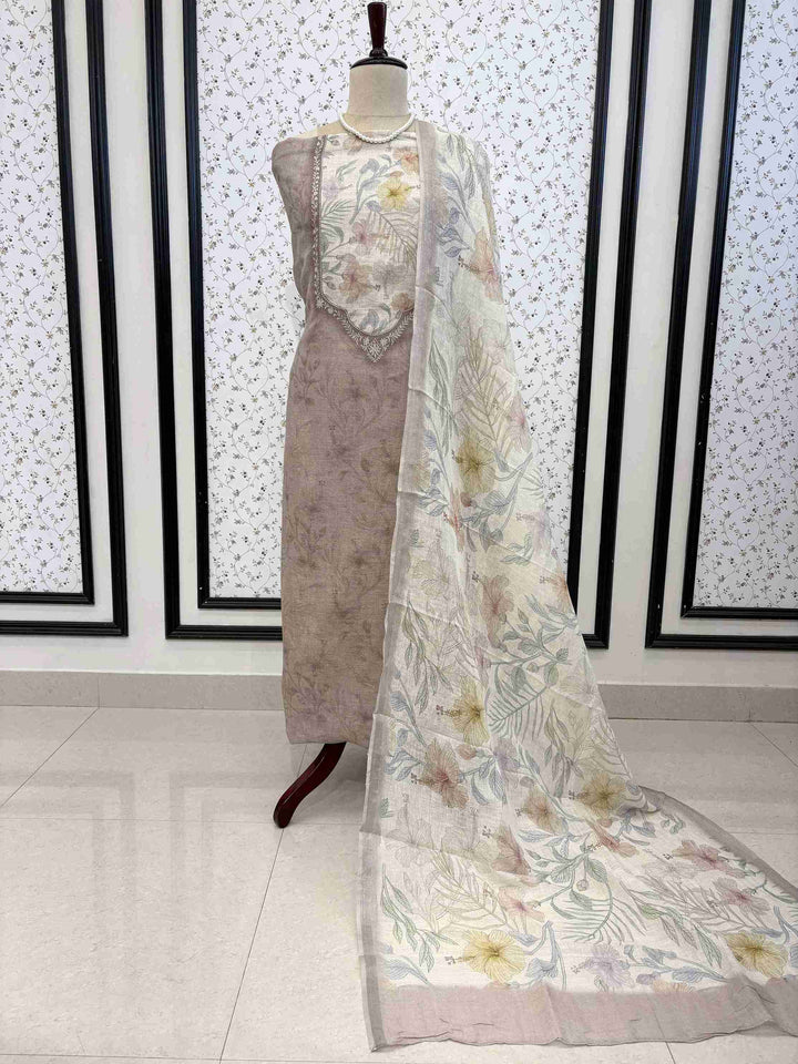 Taupe Beige pure linen unstitched suit full front view with off-white multicolor floral printed dupatta draped on mannequin