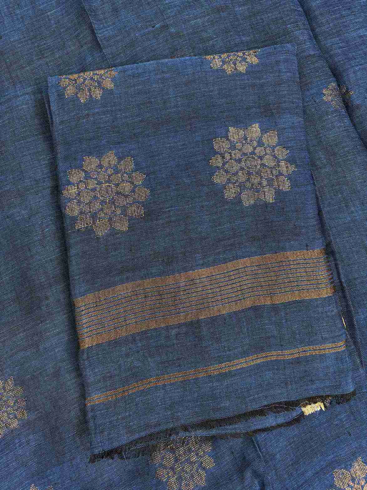  Natural slub texture and organic weave of teal blue pure handloom linen shirt fabric close-up